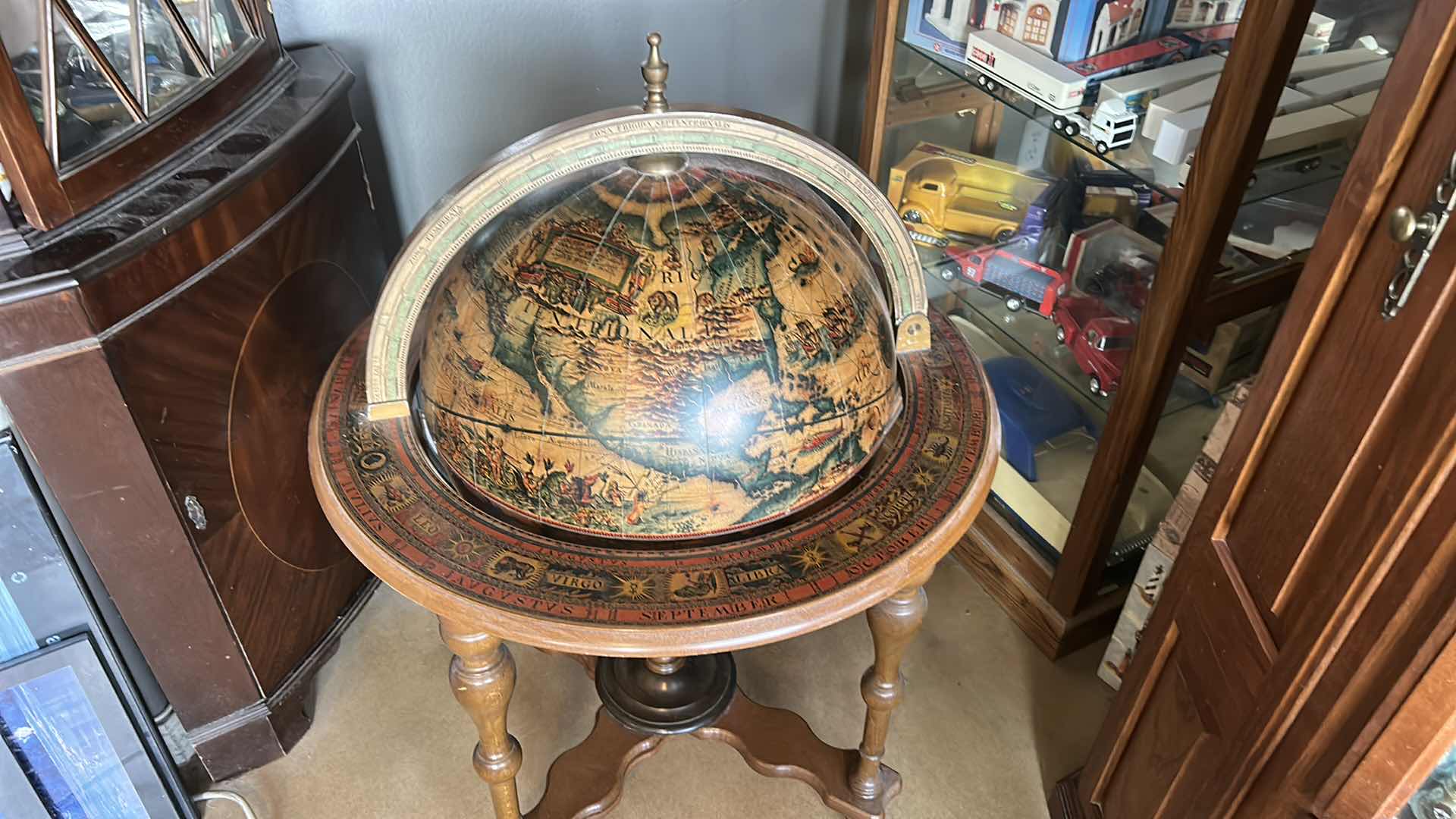 Photo 1 of VINTAGE GLOBE LIQUOR TABLE 29” x 39” (SOME DAMAGE, NEEDS TIGHTENING)