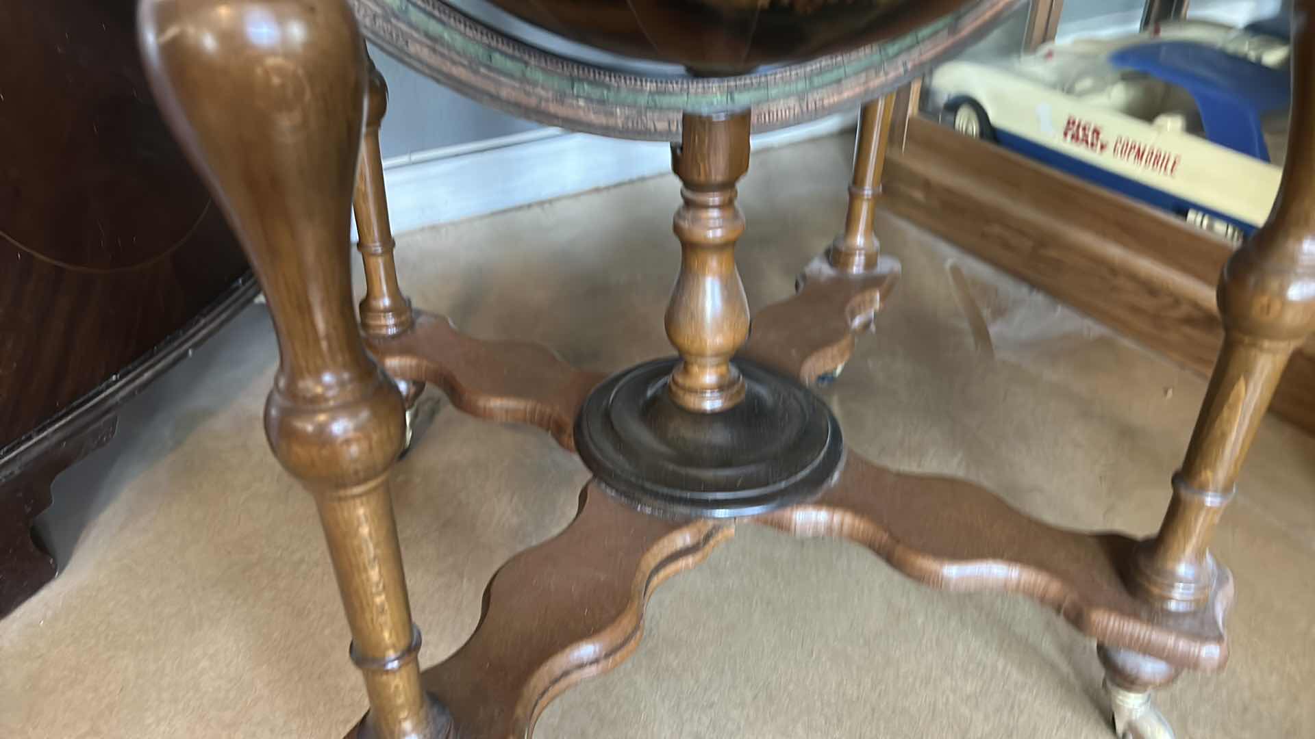 Photo 1 of VINTAGE GLOBE LIQUOR TABLE 29” x 39” (SOME DAMAGE, NEEDS TIGHTENING)