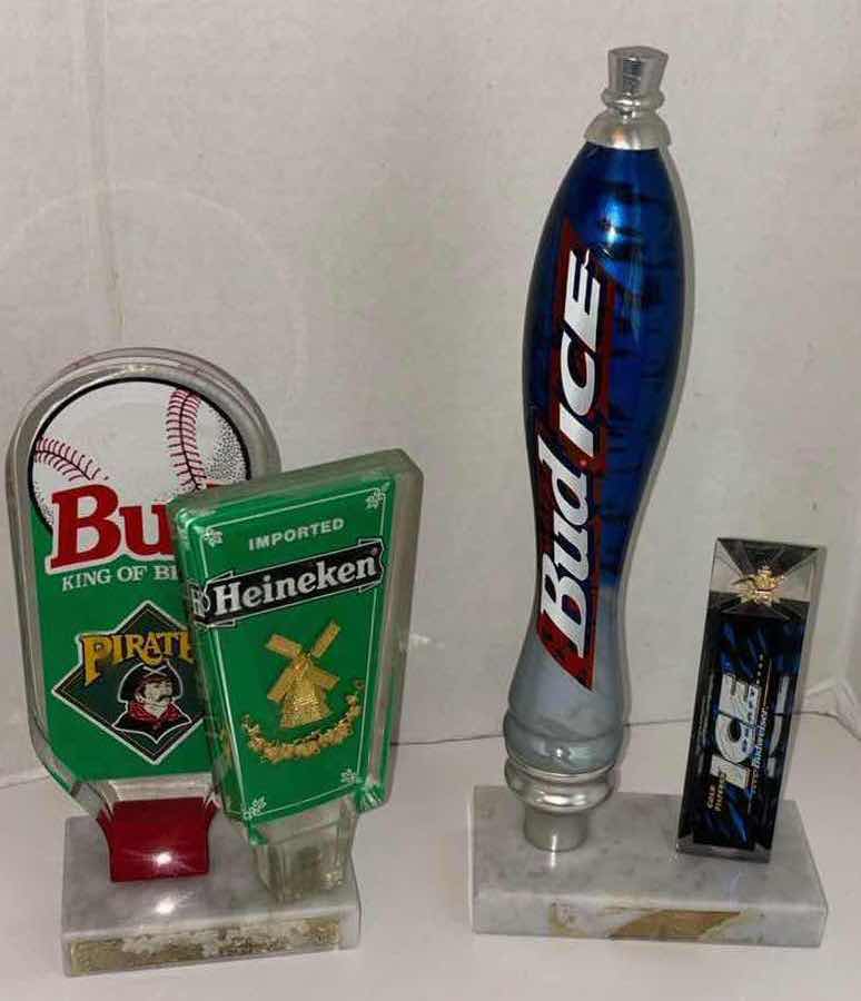 Photo 1 of BUDWEISER & HEINEKEN TAP HANDLES W BID LIGHT 2010 STANLEY CUP CHAMPIONS ALUMINUM BOTTLE