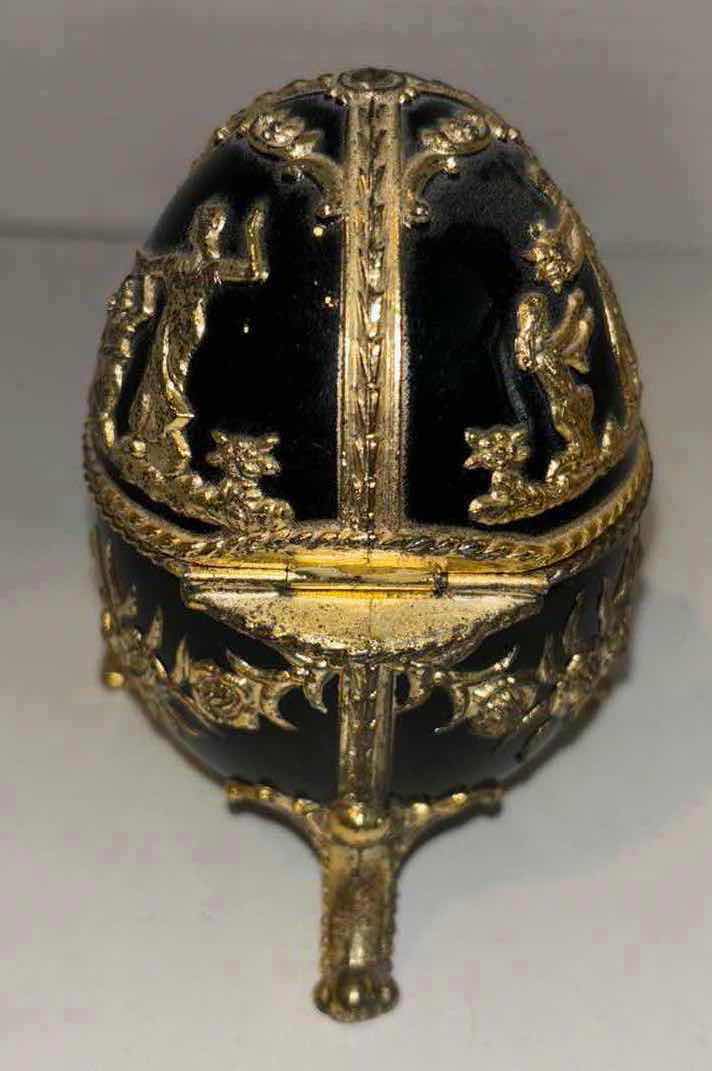 Photo 1 of VINTAGE BLACK/GOLD ENAMELED MUSIC BOX 3.5” EGG, MADE IN JAPAN
