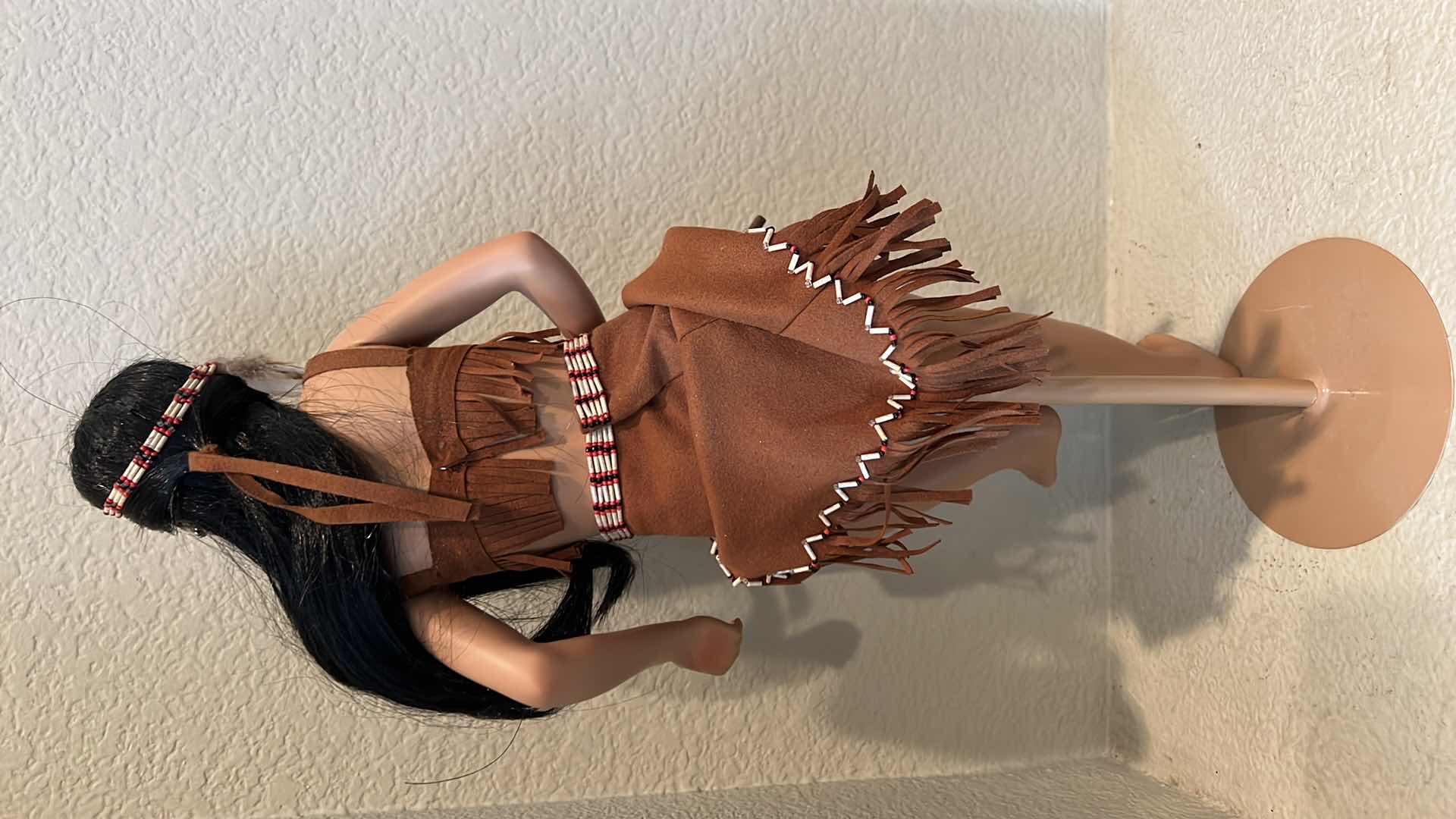 Photo 1 of PORCELAIN NATIVE AMERICAN DOLL ON STAND H21”