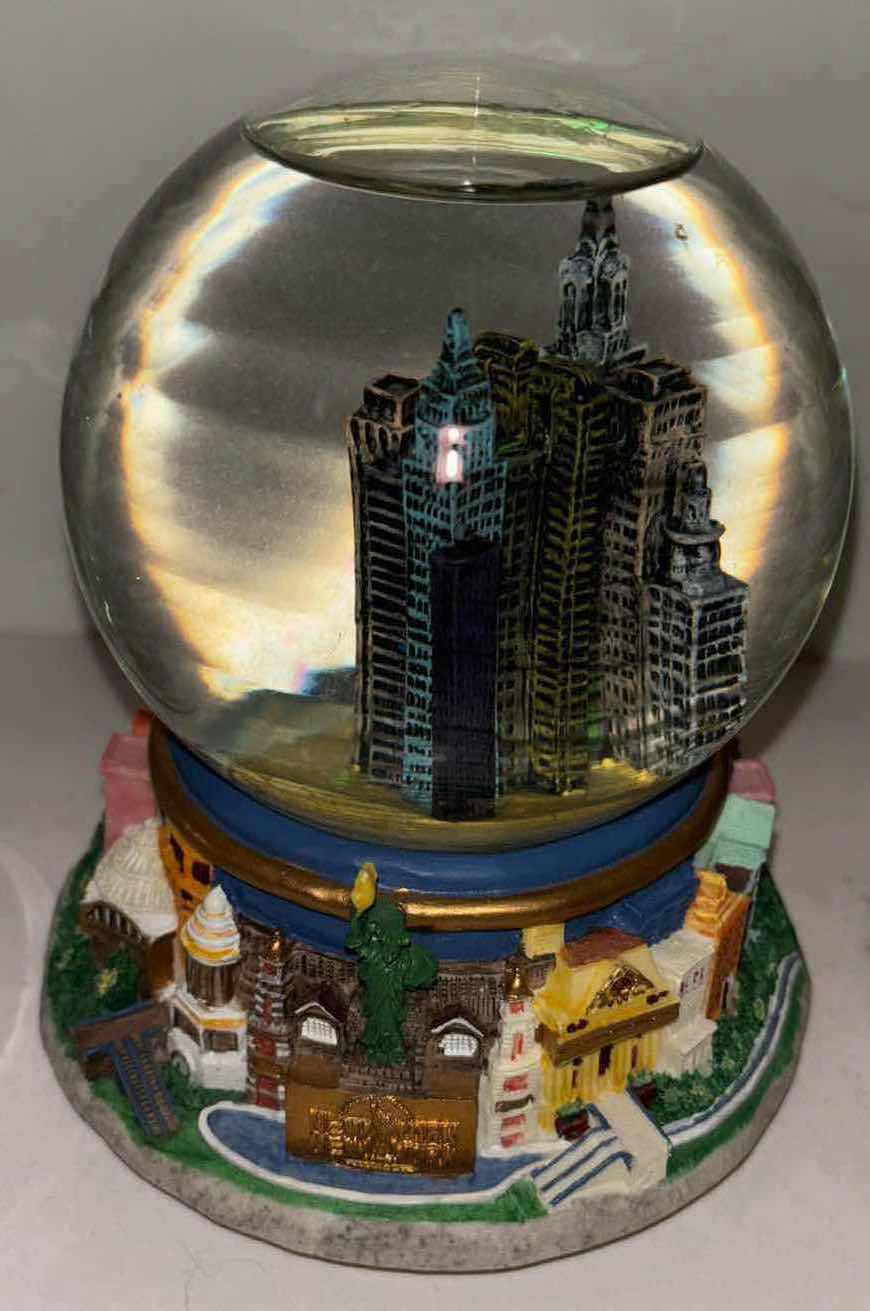 Photo 1 of ASSORTMENT OF SNOW GLOBES (4)