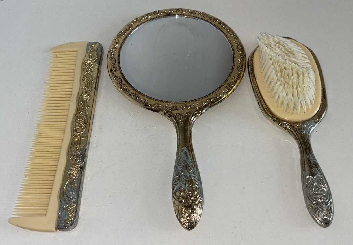 Photo 1 of DAVCO SILVER LTD GOLD TONED MIRROR, BRUSH & COMB VANITY SET (COMB IS 7.25”)