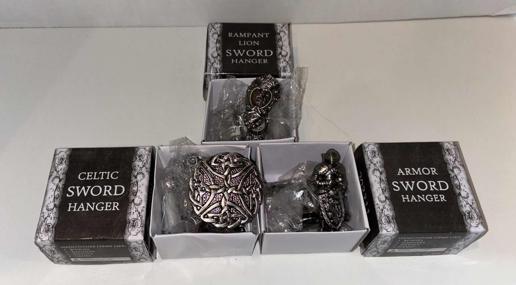 Photo 2 of 3- ASSORTED SWORD HANGERS (CELTIC, RAMPANT LION & ARMOR)