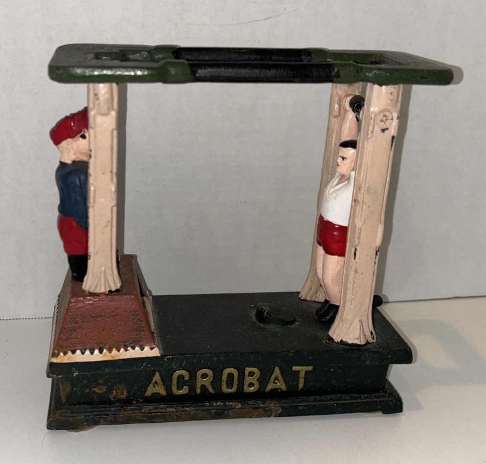 Photo 1 of ANTIQUE ACROBAT MECHANICAL CAST IRON COIN BANK