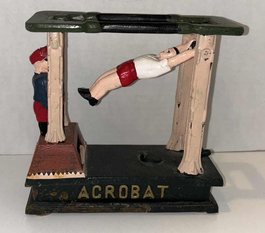Photo 2 of ANTIQUE ACROBAT MECHANICAL CAST IRON COIN BANK