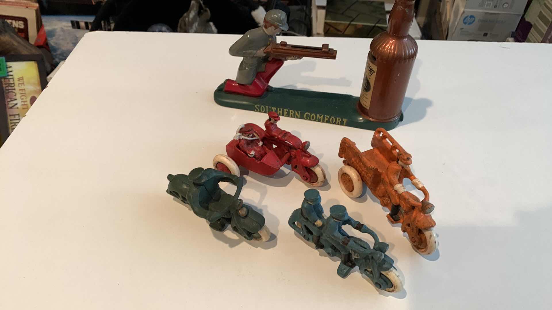 Photo 1 of CAST IRON MOTORCYCLE TOYS