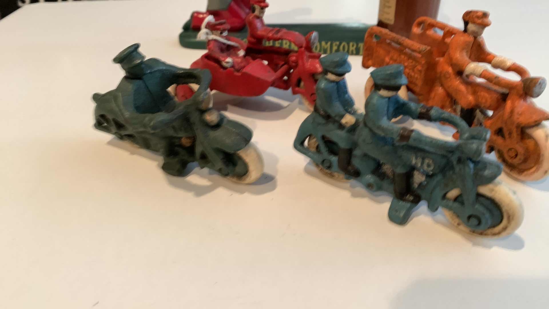 Photo 1 of CAST IRON MOTORCYCLE TOYS