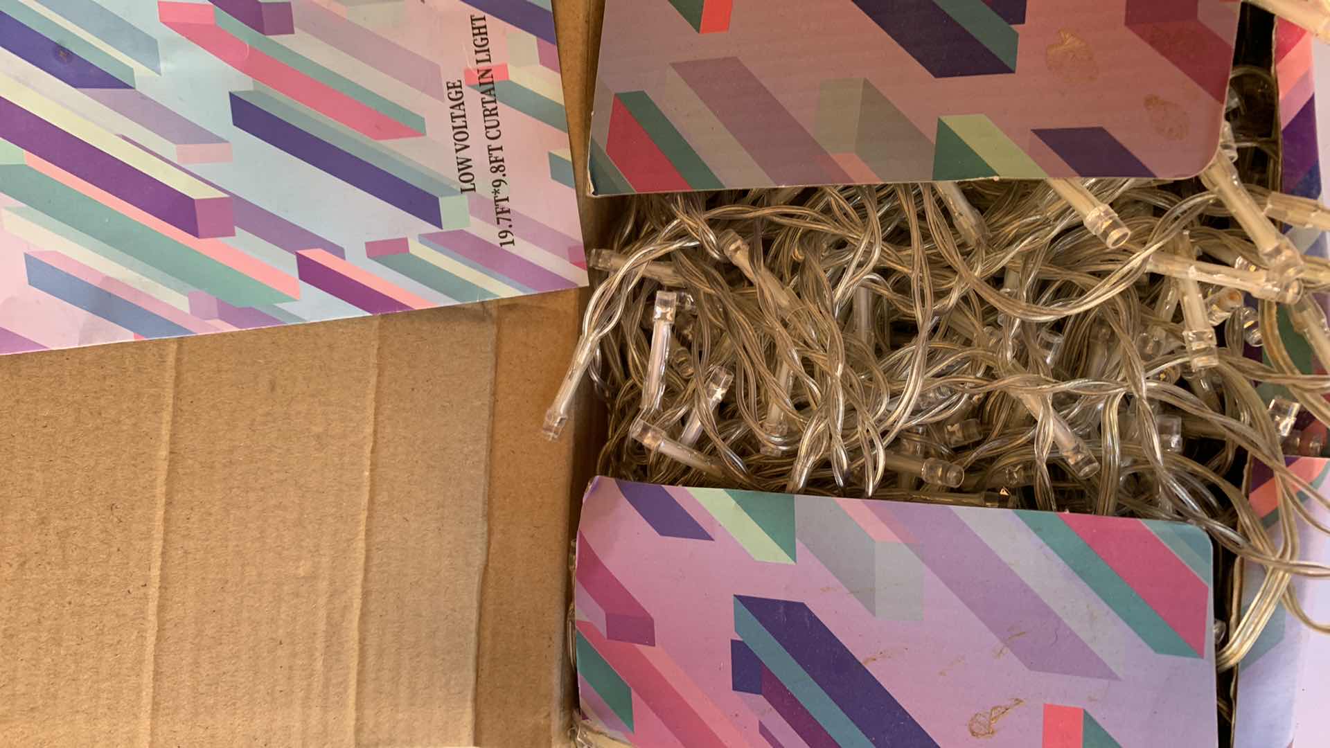 Photo 1 of PAIR OF OUTDOOR 9’ UMBRELLA CANOPYS AND CURTAIN LIGHTS