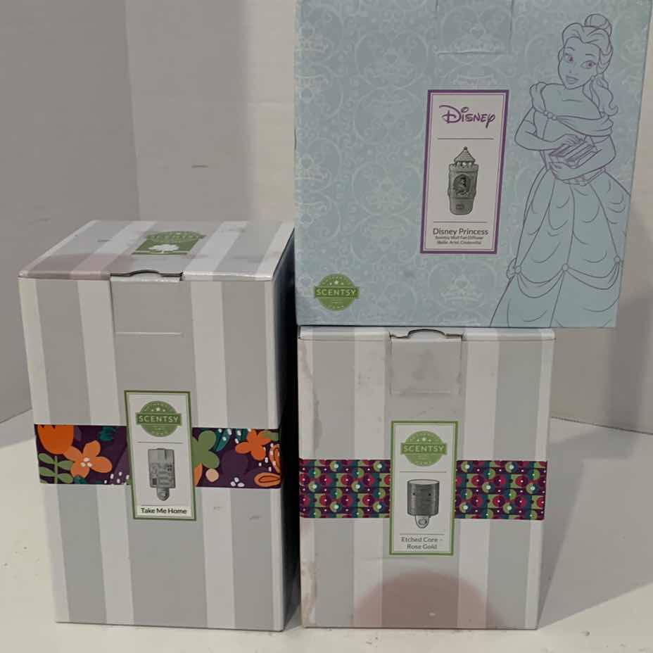 Photo 1 of THREE SCENTSY WAX WARMERS: DISNEY PRINCESS, TAKE ME HOME, AND ETCHED CORE-ROSE GOLD