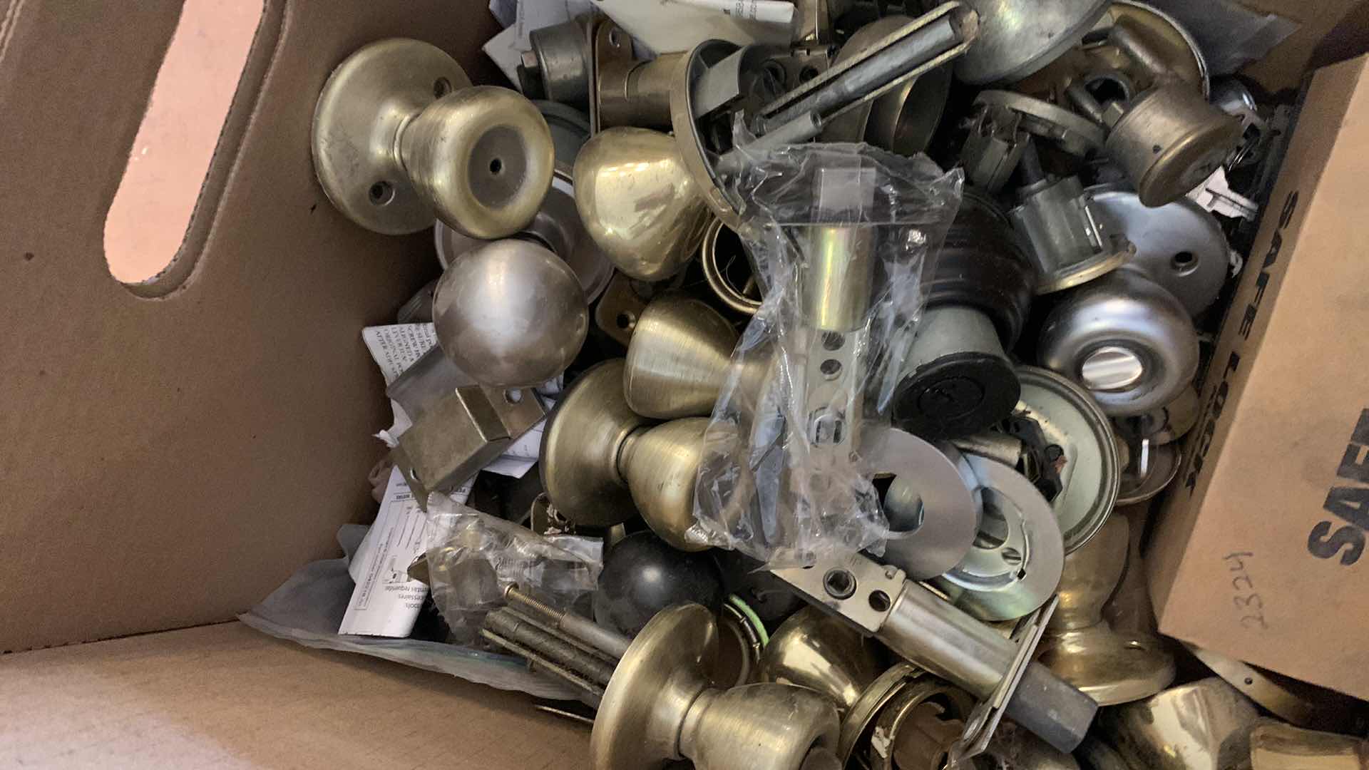 Photo 1 of BOX OF DOOR LOCKS AND HANDLES