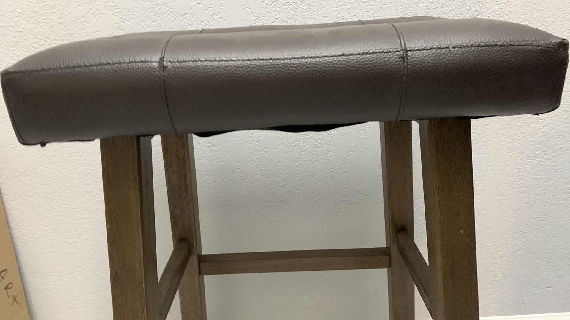 Photo 1 of FAUX LEATHER COUNTER STOOL 18” X 11” H 28”