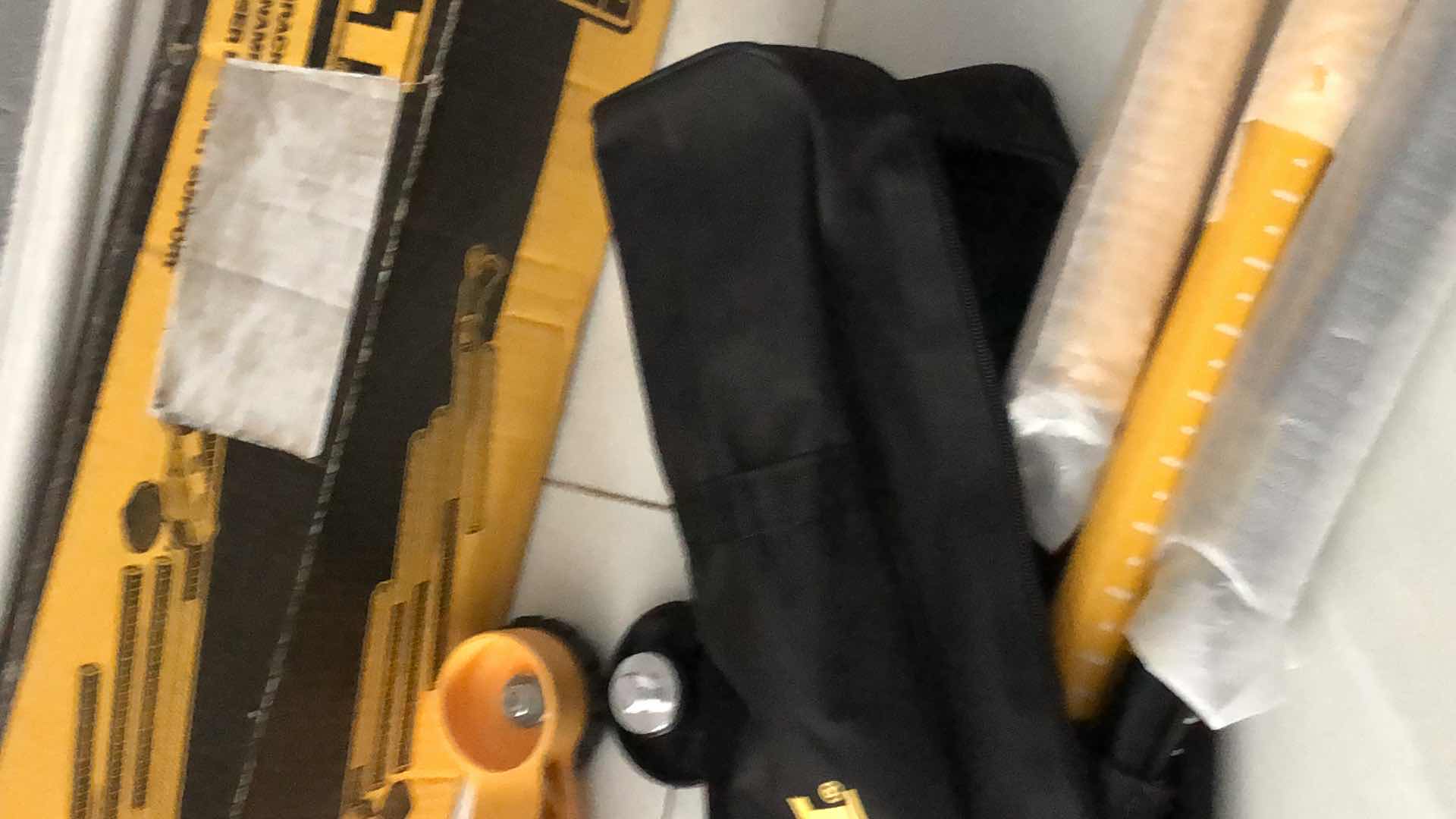 Photo 1 of DEWALT 10’ LASER POSITIONING POLE AND BRACKET