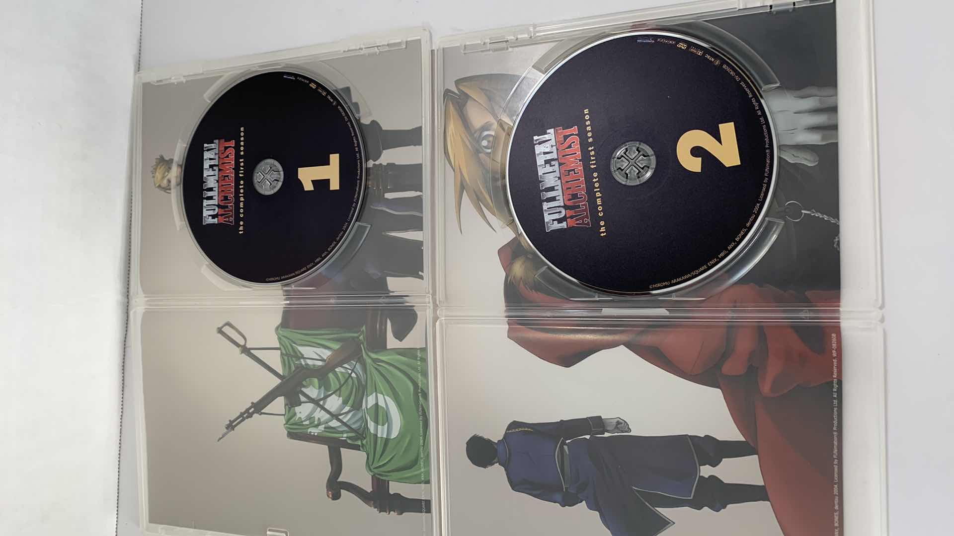 Photo 1 of FULLMETAL ALCHEMIST THE COMPLETE FIRST EDITION PART ONE AND TWO DVD SET