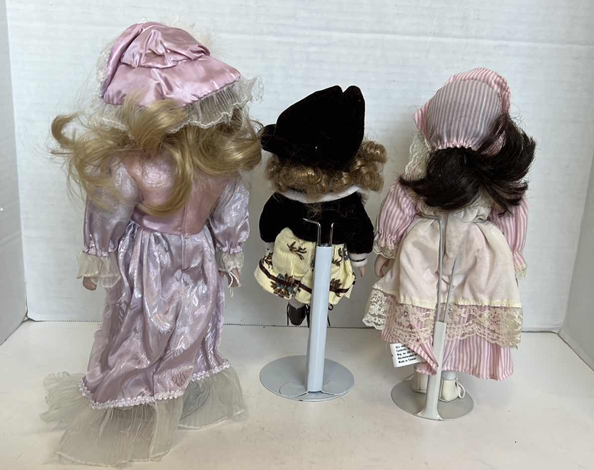 Photo 1 of 3 - PORCELAIN FACED DOLLS