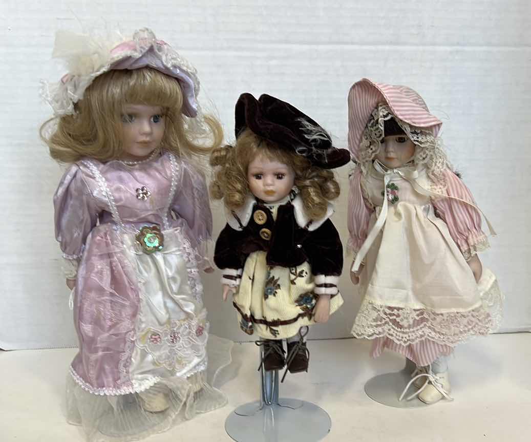 Photo 1 of 3 - PORCELAIN FACED DOLLS
