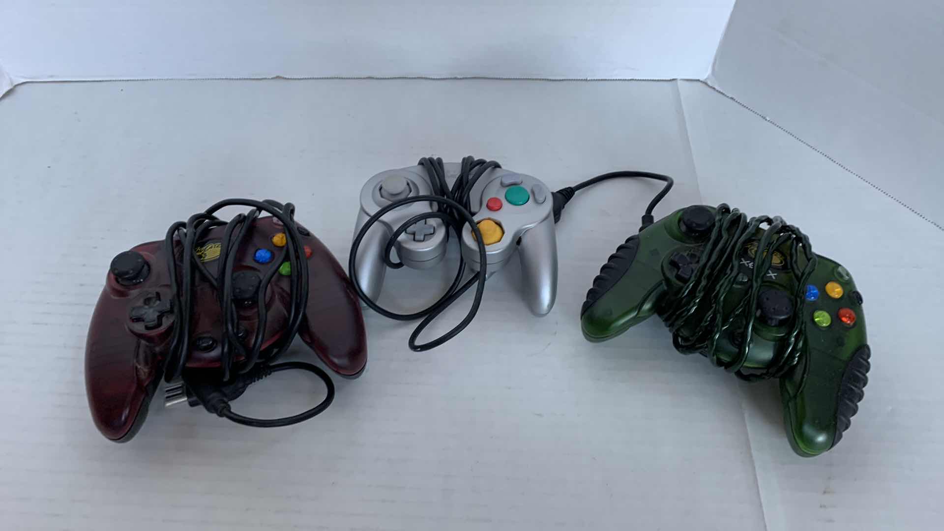 Photo 1 of 2-XBOX AND 1 NINTENDO GAME CUBE CONTROLLERS