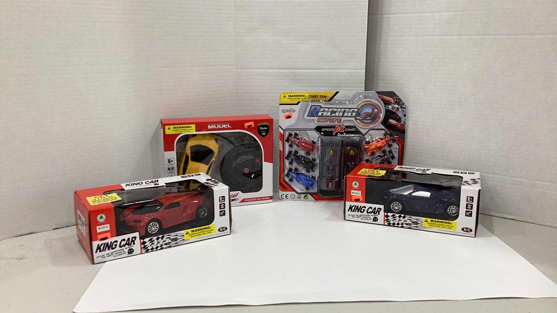 Photo 1 of 4 PCS NEW REMOTE CONTROL AND RACING CAR TOYS