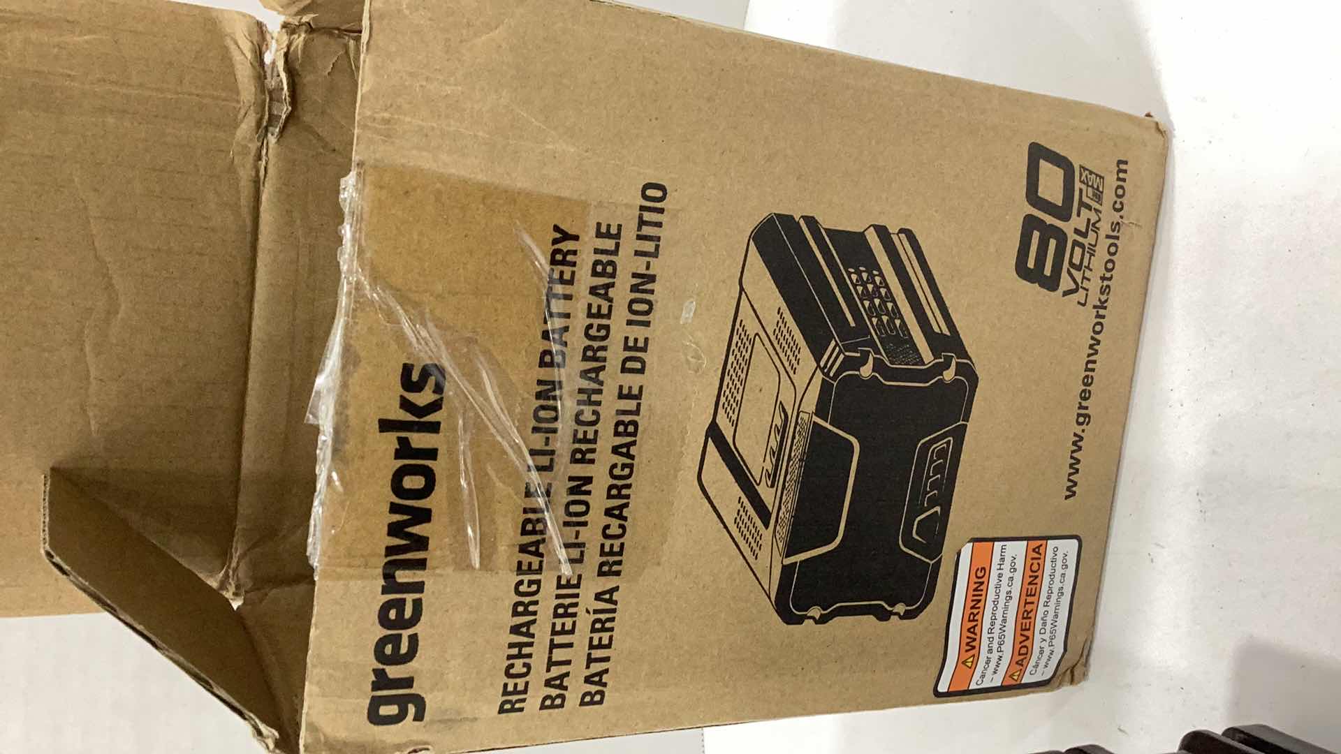 Photo 1 of GREENWORKS 80 VOLT BATTERY