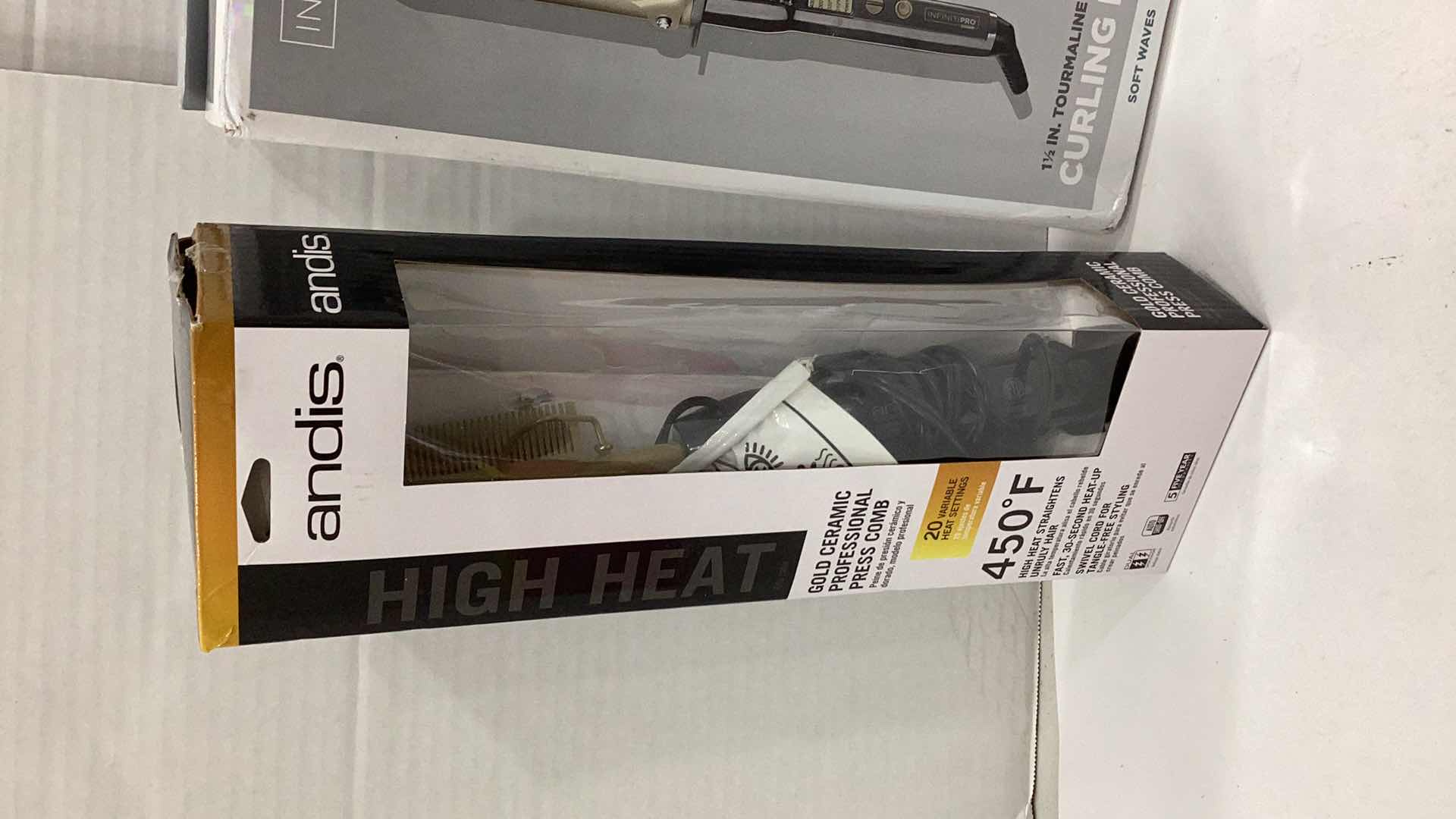 Photo 2 of CONAIR CURLING IRON AND ANDIS PRESS COMB