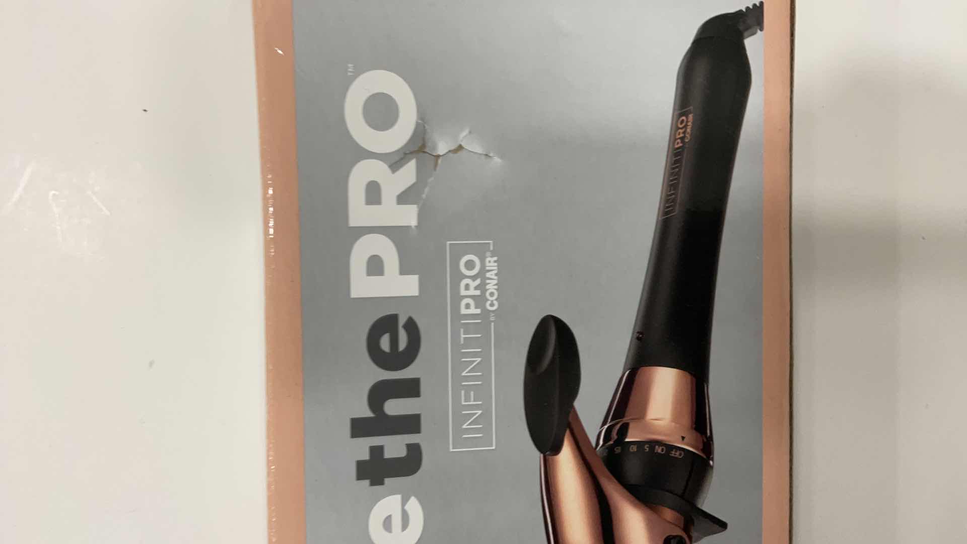 Photo 1 of CONAIR INFINITI PRO CURLING IRON 1 1/2 INCH ROSE GOLD TITANIUM