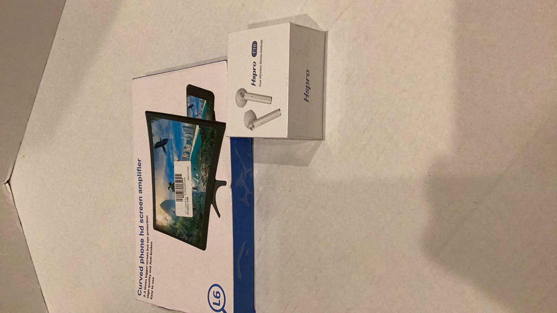 Photo 1 of EARBUDS AND CURVED PHONE HD SCREEN AMPLIFIER