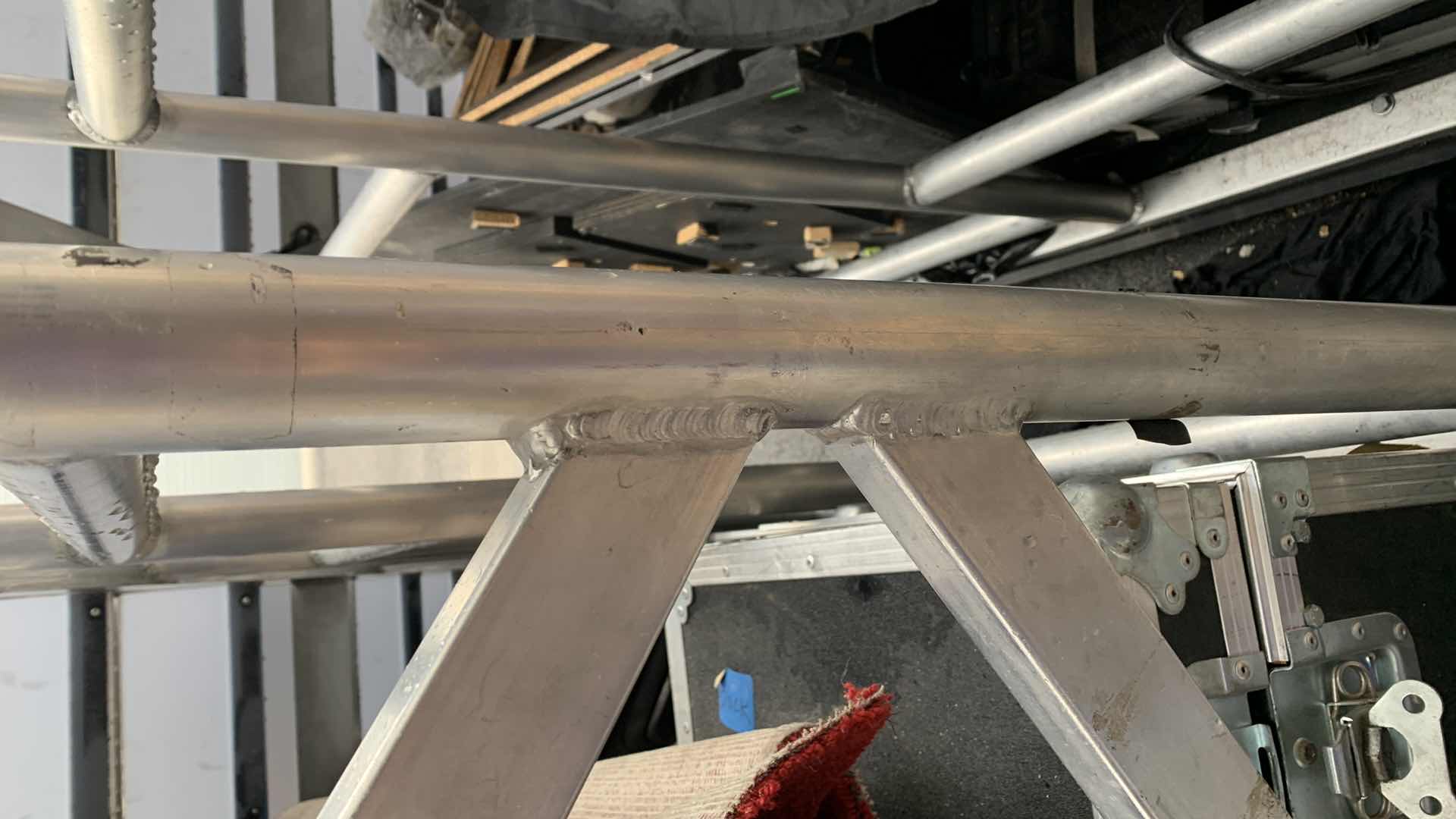 Photo 1 of ONE LARGE HEAVY DUTY ELEVEN STEP METAL AND PEXI-GLASS STAGE STAIRS WITH WHEELS W 4’ X 12’ H 7’4”