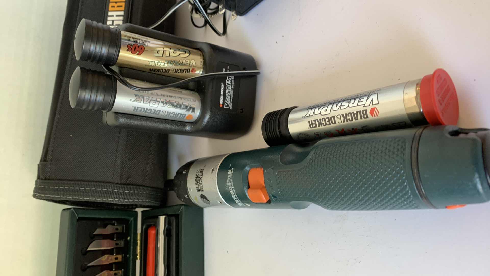 Photo 1 of BLACK AND DECKER VERSAPACK SCREWDRIVER WITH BATTERIES AND XACTO KNIFE SET