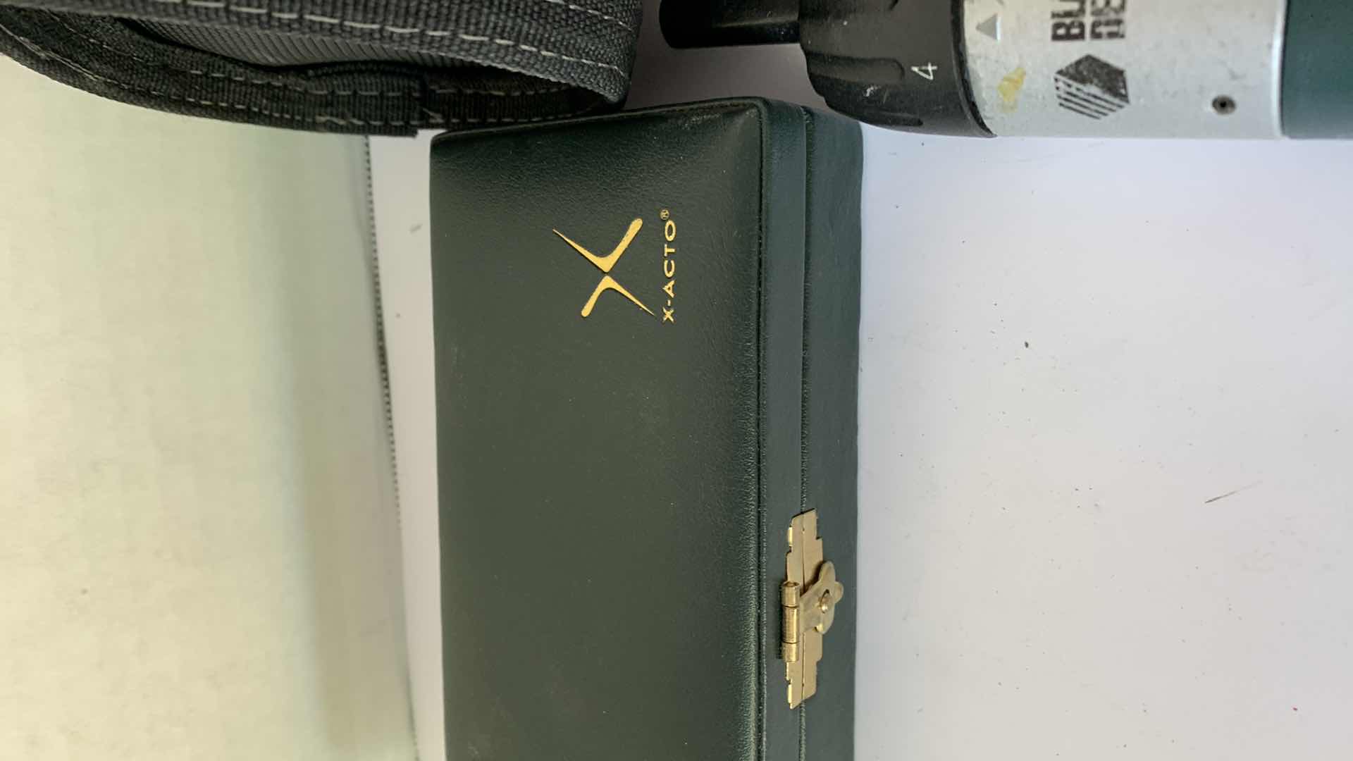 Photo 1 of BLACK AND DECKER VERSAPACK SCREWDRIVER WITH BATTERIES AND XACTO KNIFE SET