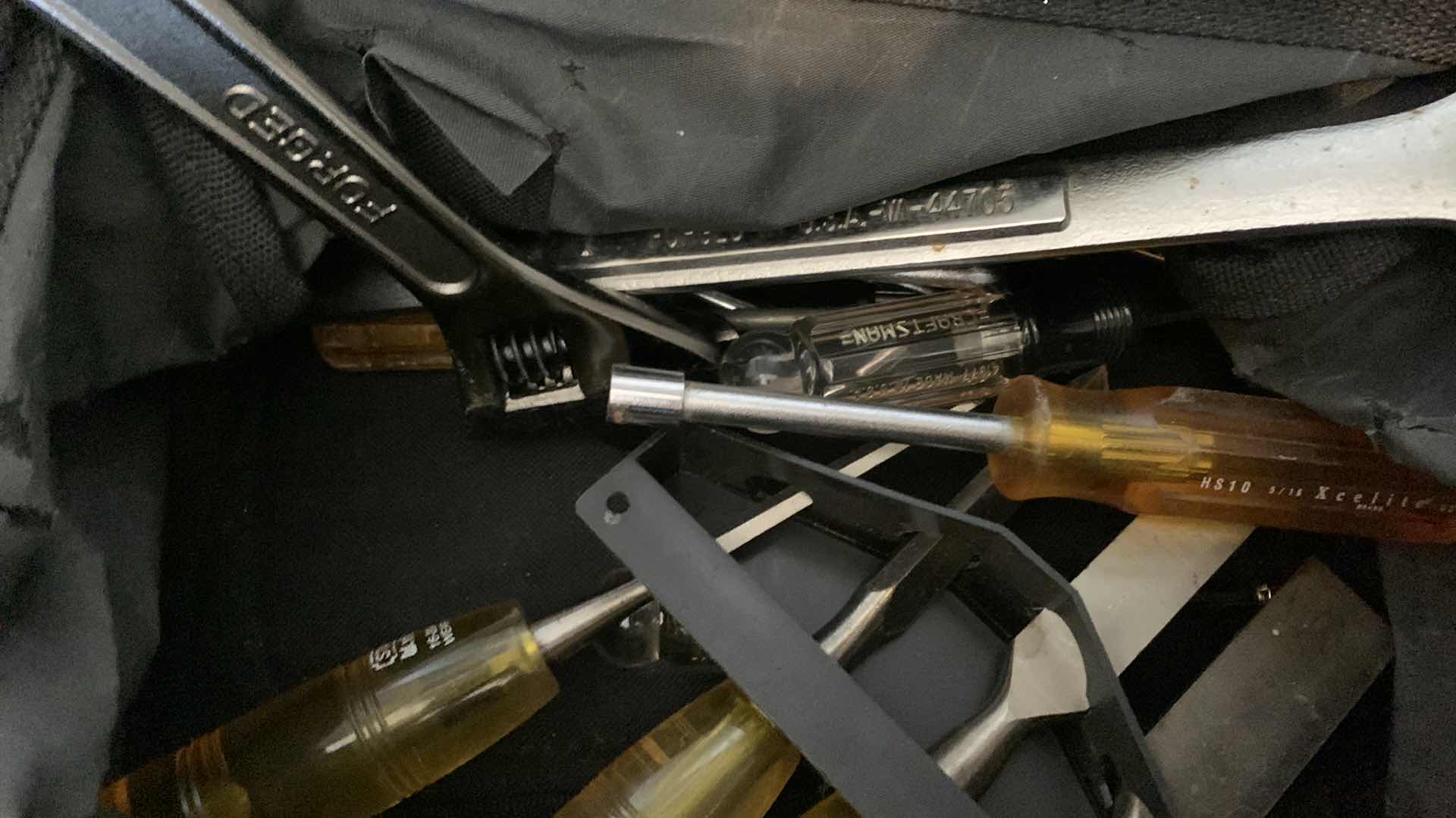 Photo 1 of CRAFTSMAN BAG WITH NUT RUNNERS,  CHISELS AND WRENCHES