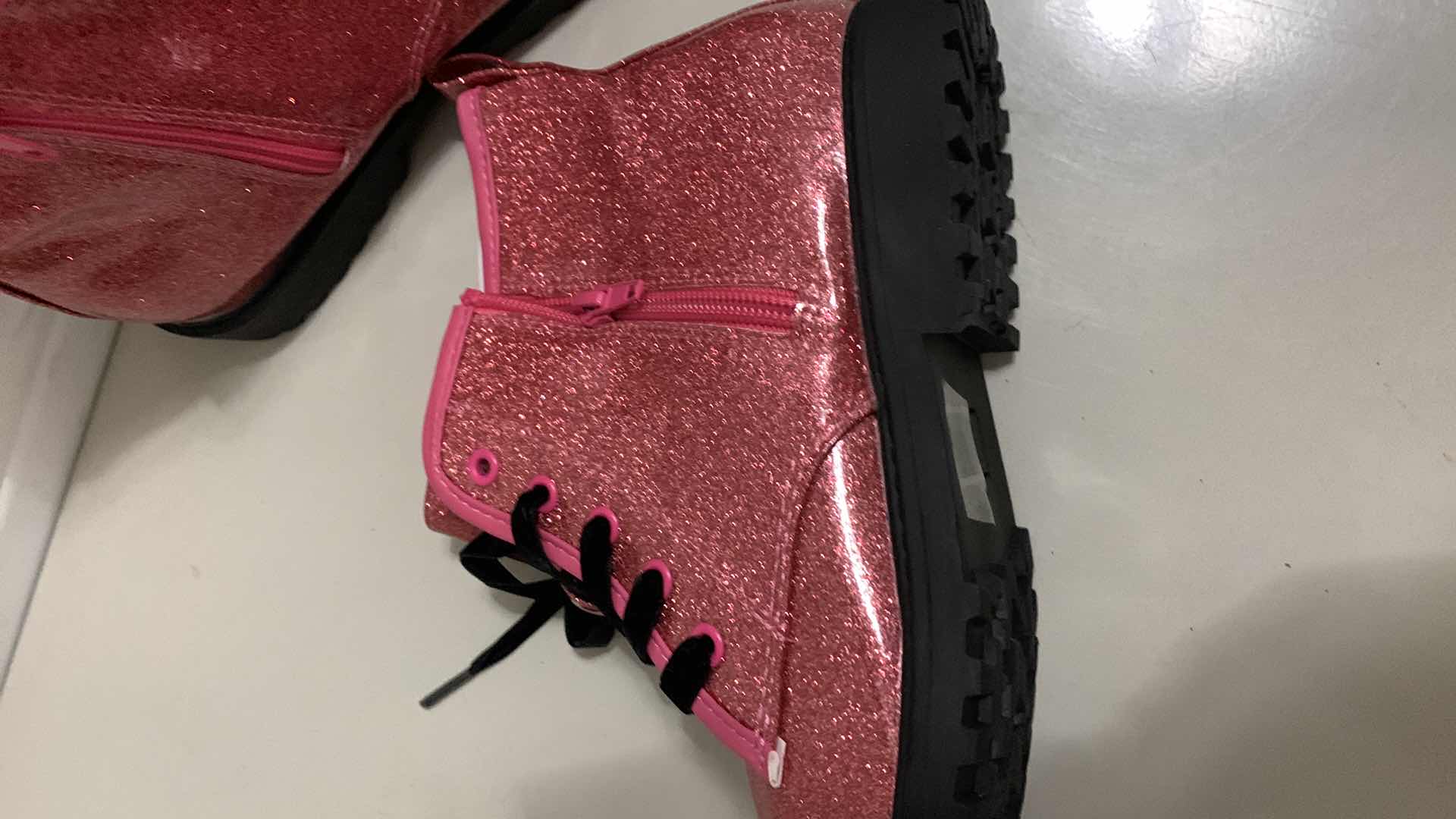 Photo 1 of GIRLS PINK METTALIC BOOTS SIZE 4