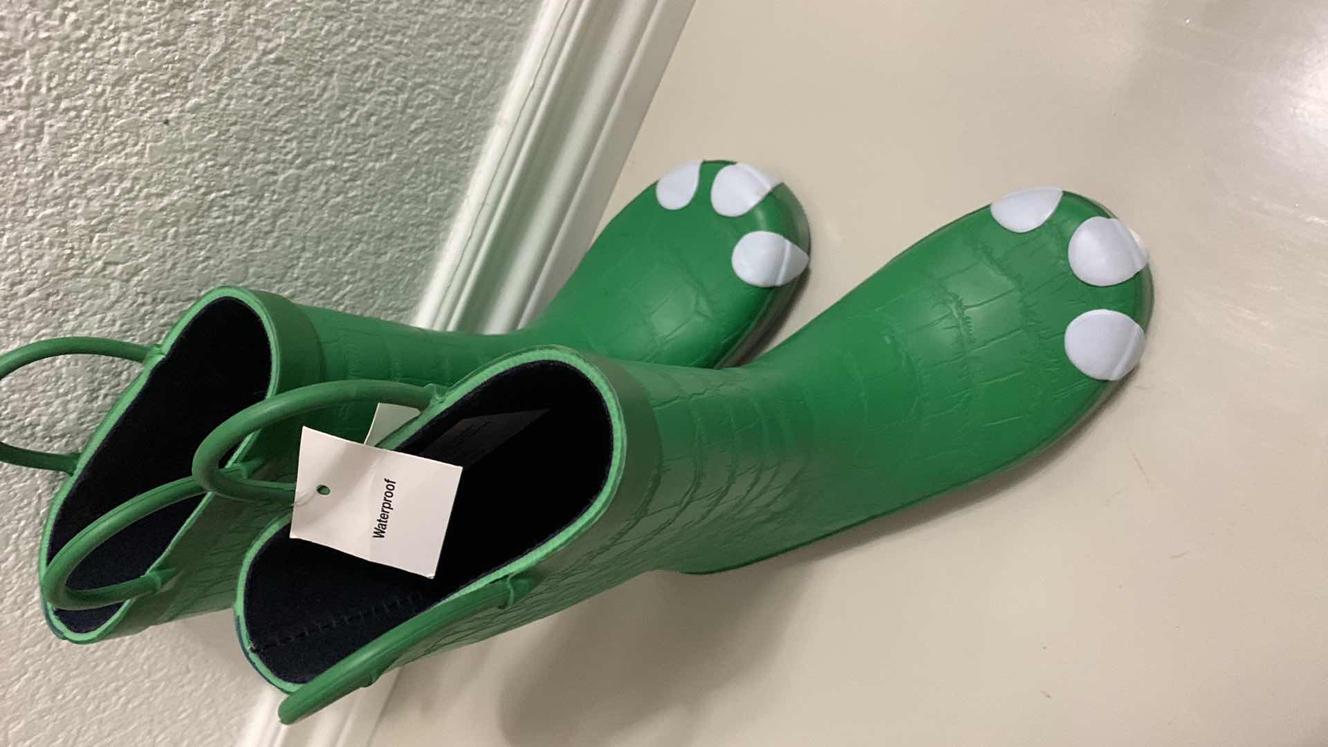 Photo 1 of KIDS WATERPROOF DINOSAUR BOOTS SIZE 12