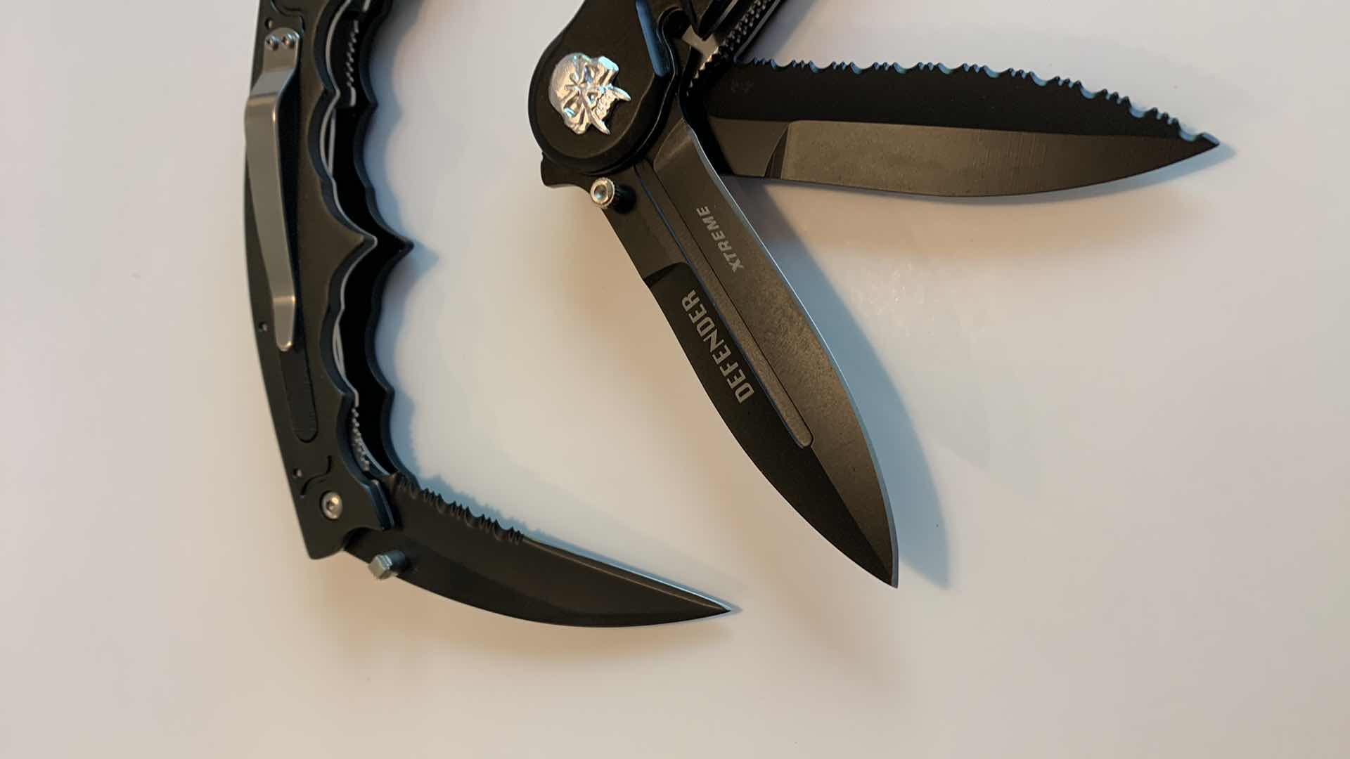 Photo 1 of TWO MULTI BLADE KNIVES
