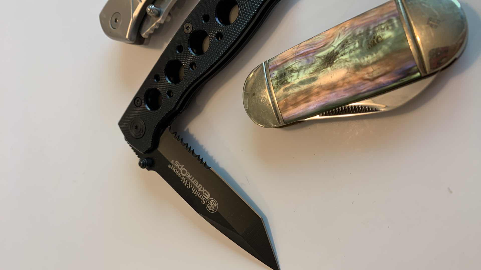 Photo 1 of THREE KNIVES ONE IS SMITH & WESSON