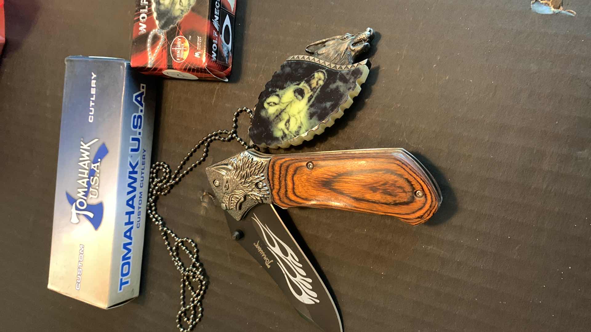 Photo 1 of PAIR OF WOLF INSPIRED KNIVES