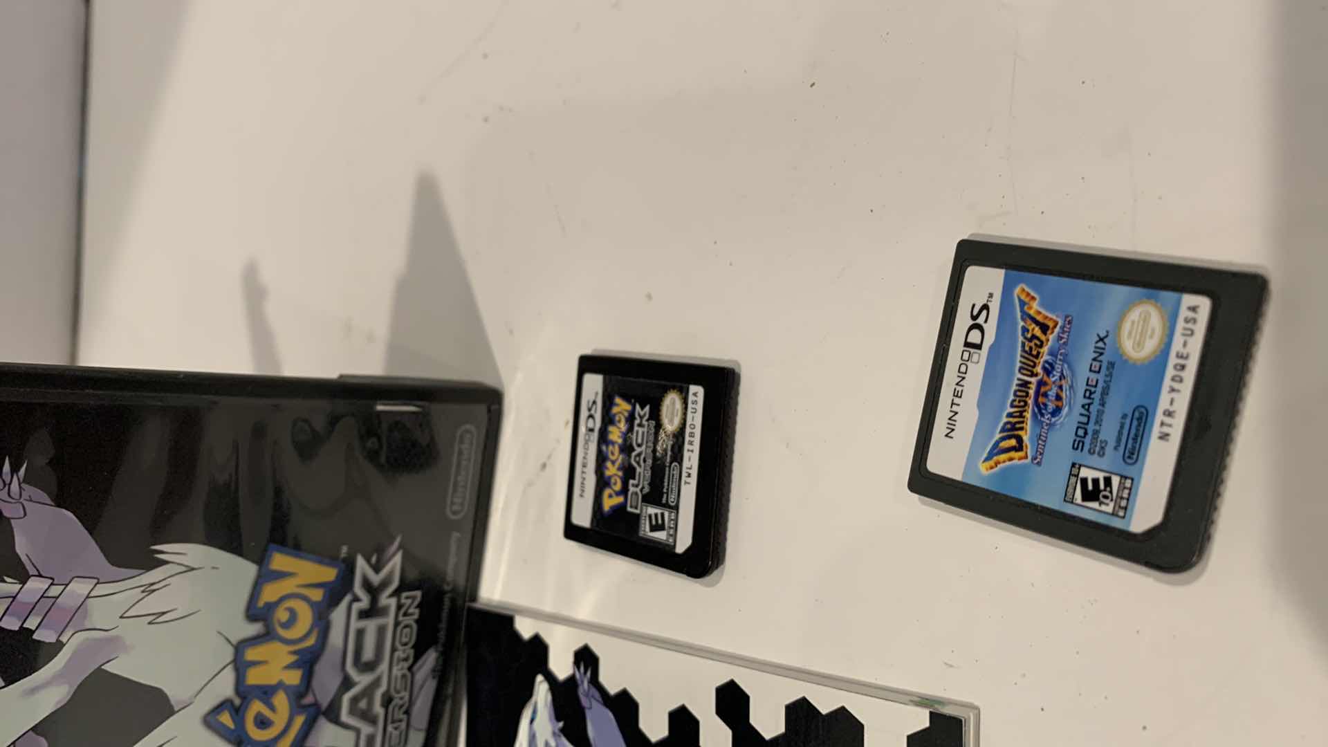 Photo 1 of NINTENDO DS POKÉMON BLACK VERSION AND DRAGON QUEST GAME