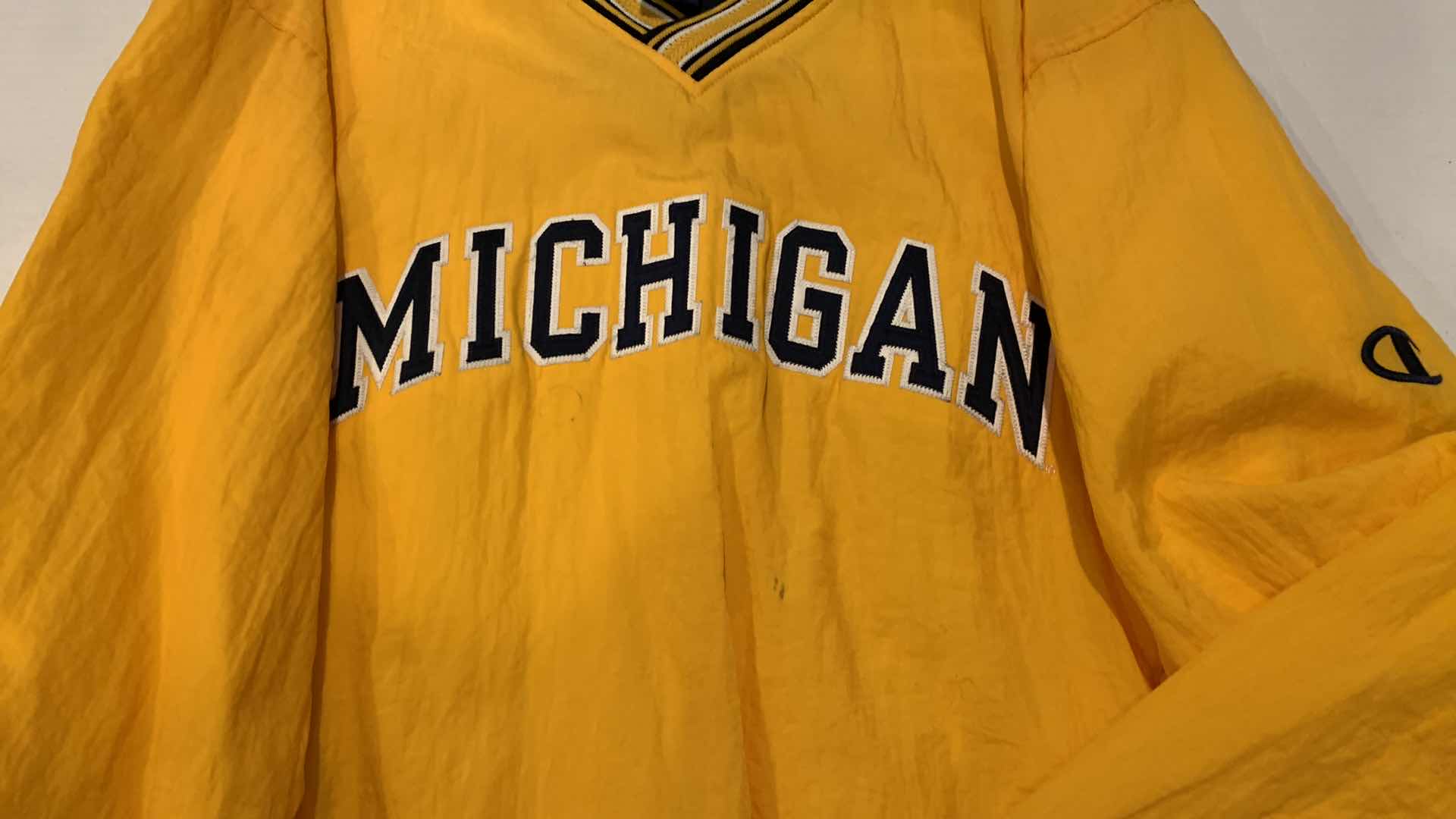 Photo 1 of MENS CHAMPION MICHIGAN RAIN PULL OVER SIZE XL