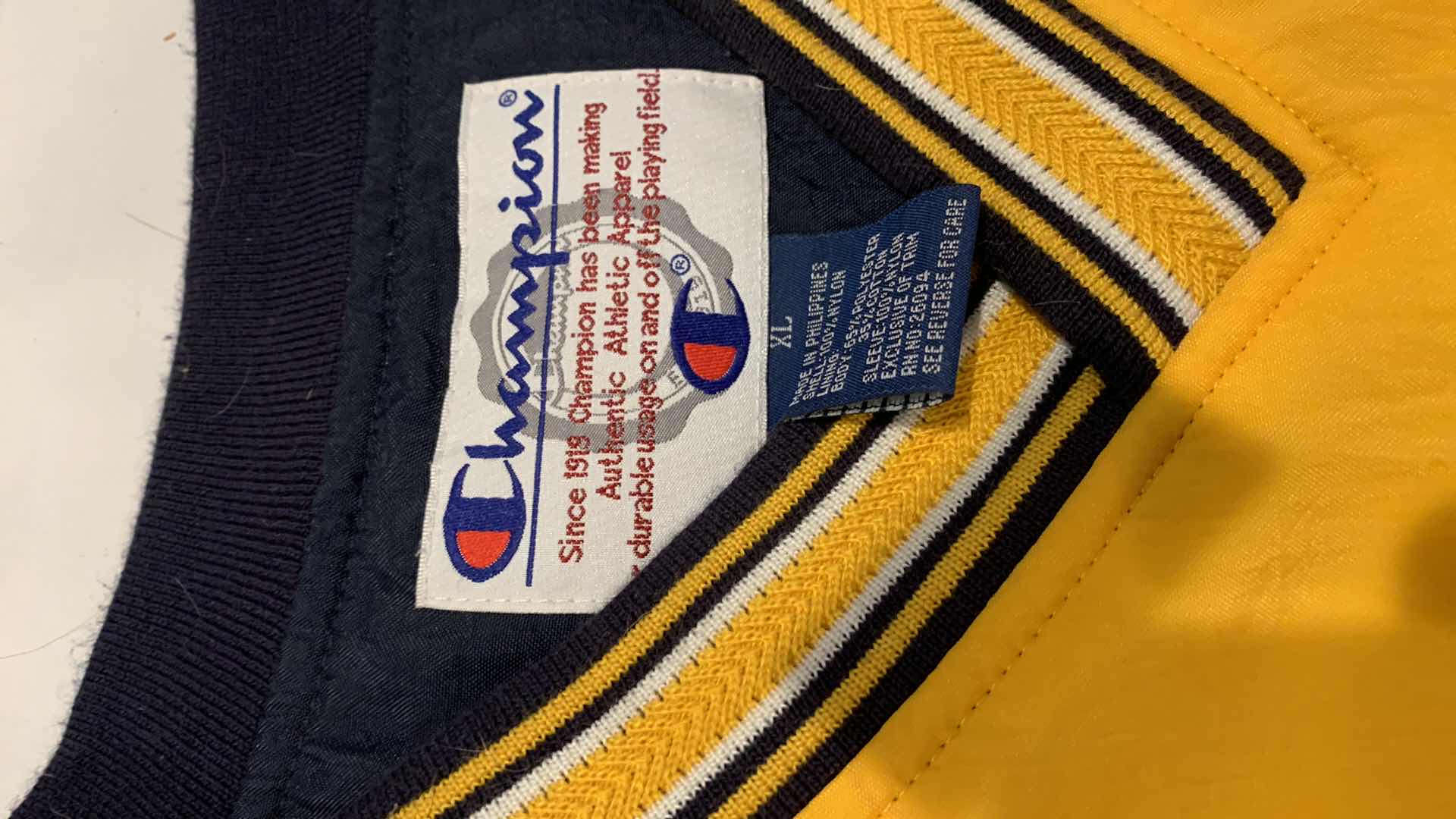 Photo 1 of MENS CHAMPION MICHIGAN RAIN PULL OVER SIZE XL