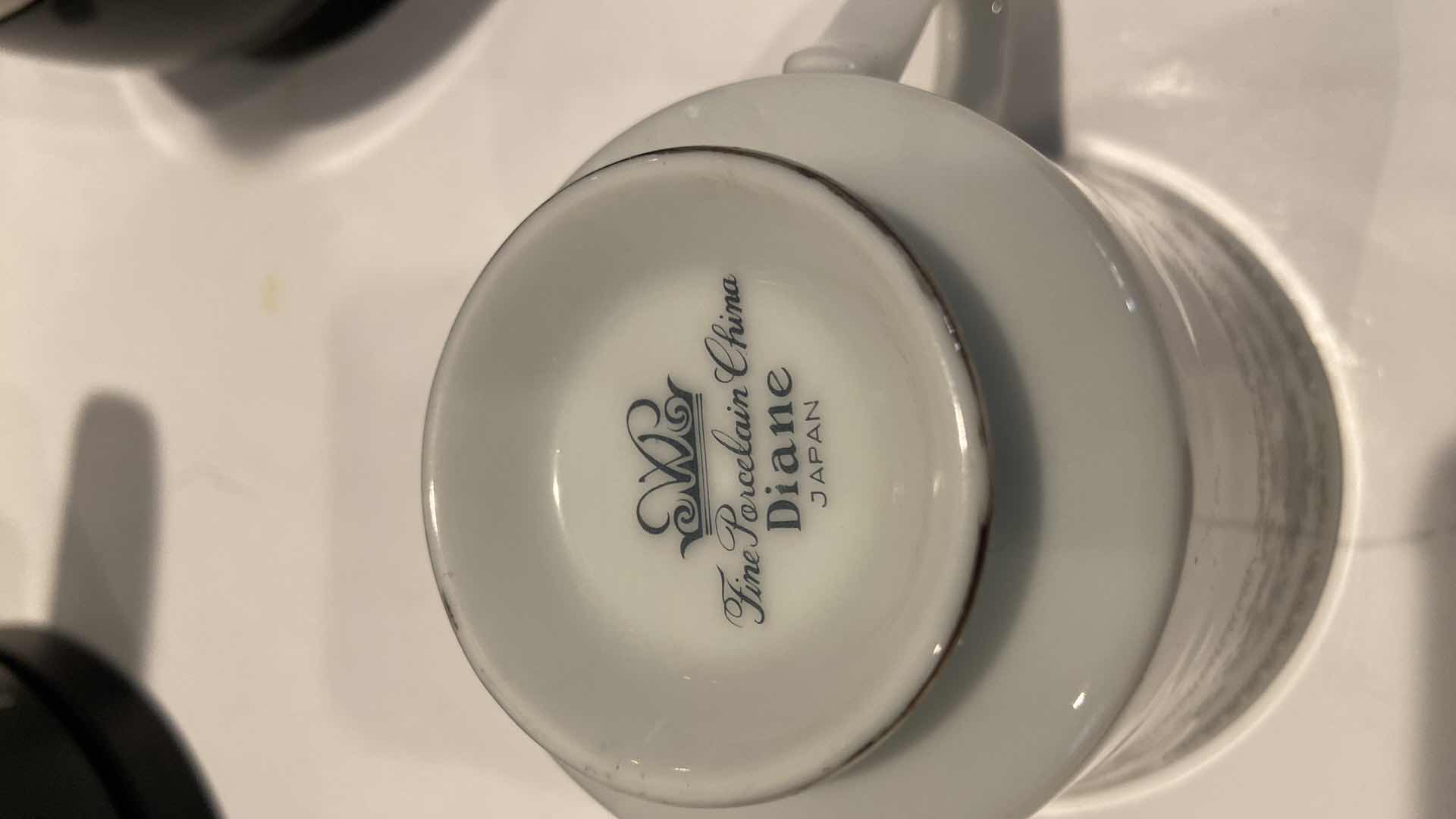 Photo 1 of COFFEE MAKERS AND PORCELAIN CUP