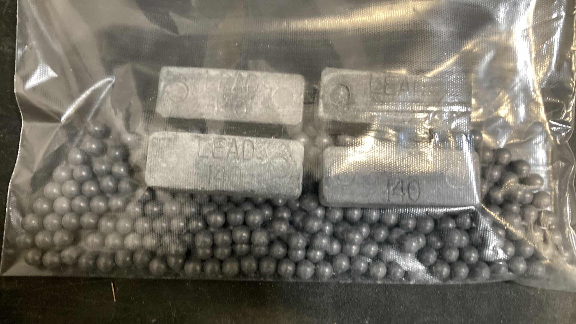 Photo 1 of 140 LEAD INGOTS (4) W LEAD BALLS