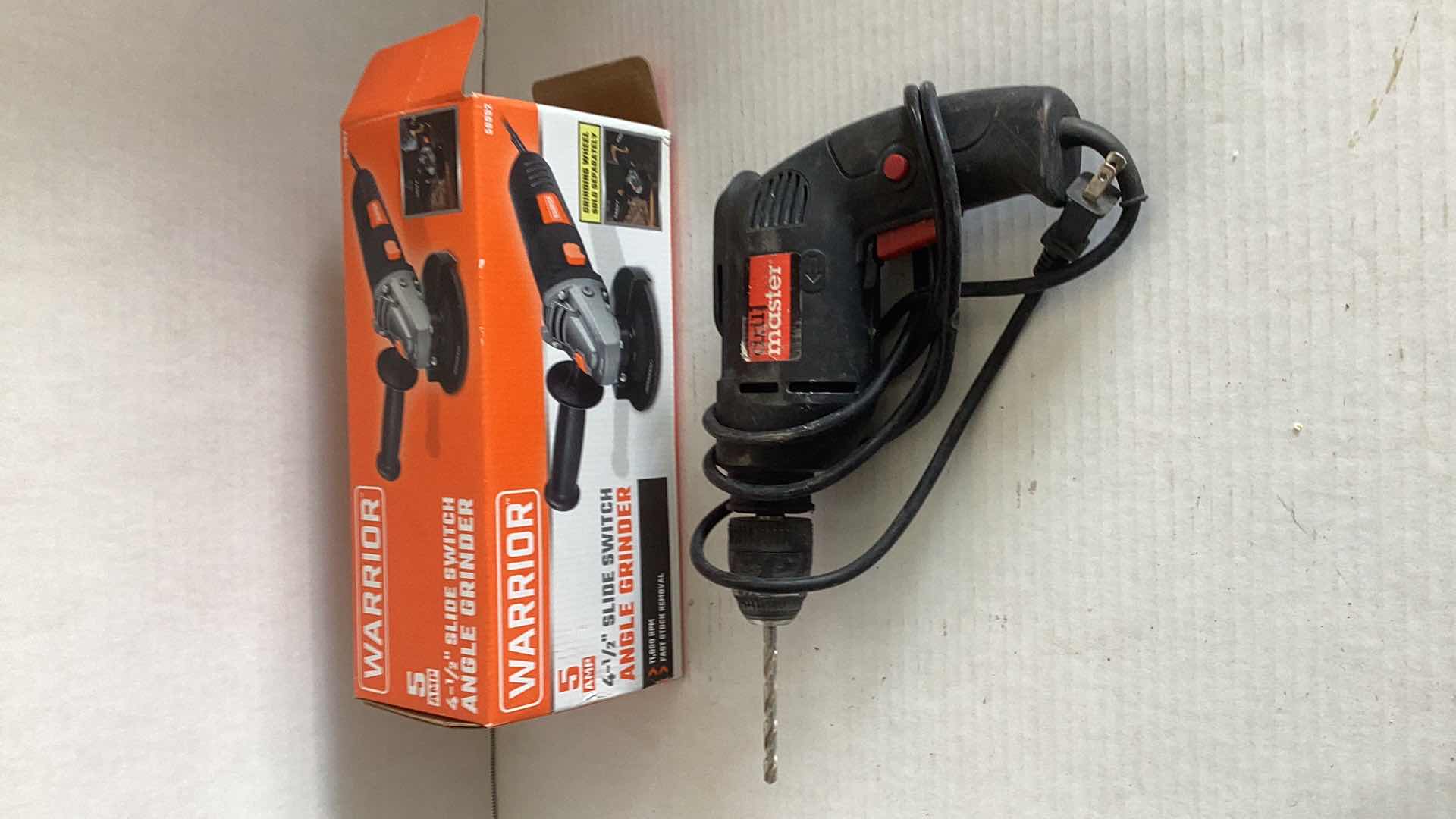 Photo 1 of ANGLE GRINDER AND ELECTRIC DRILL