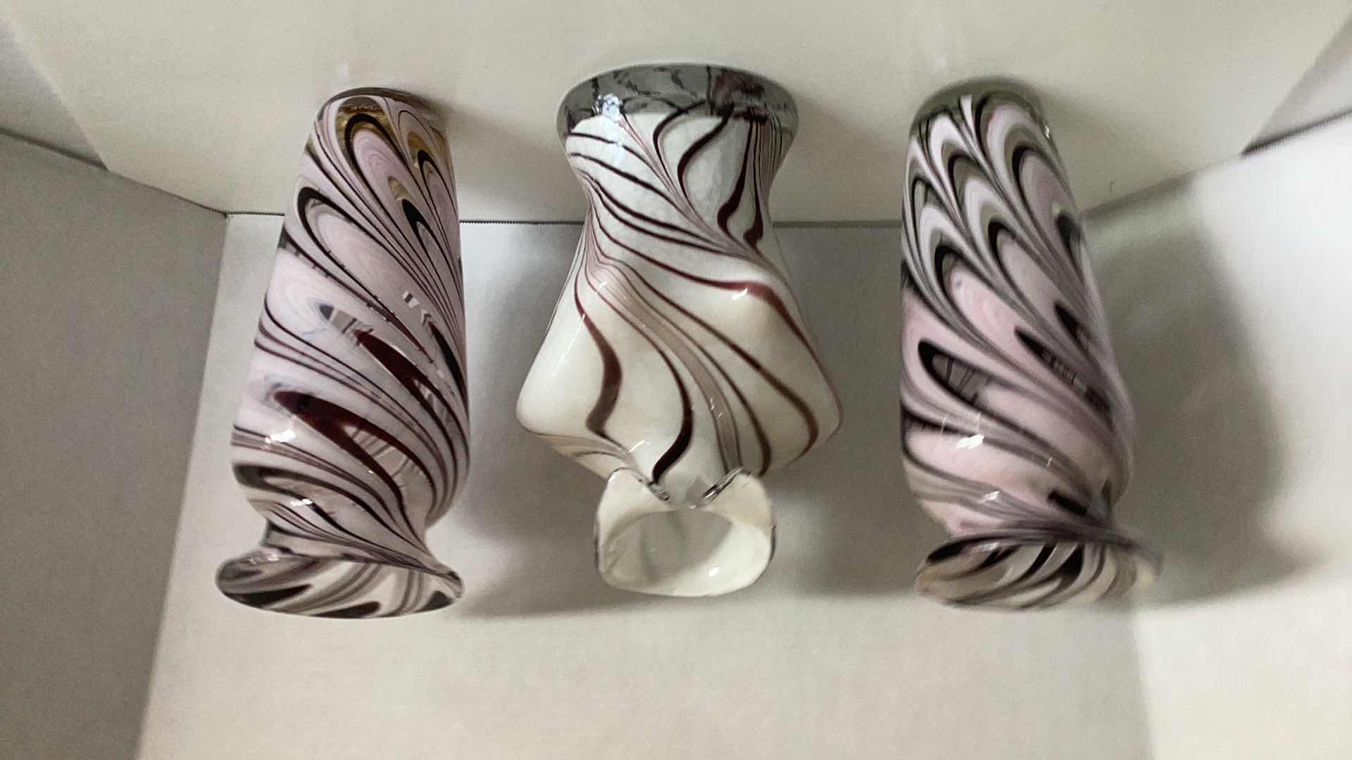 Photo 1 of THREE SWIRLED GLASS VASES 12” TALL