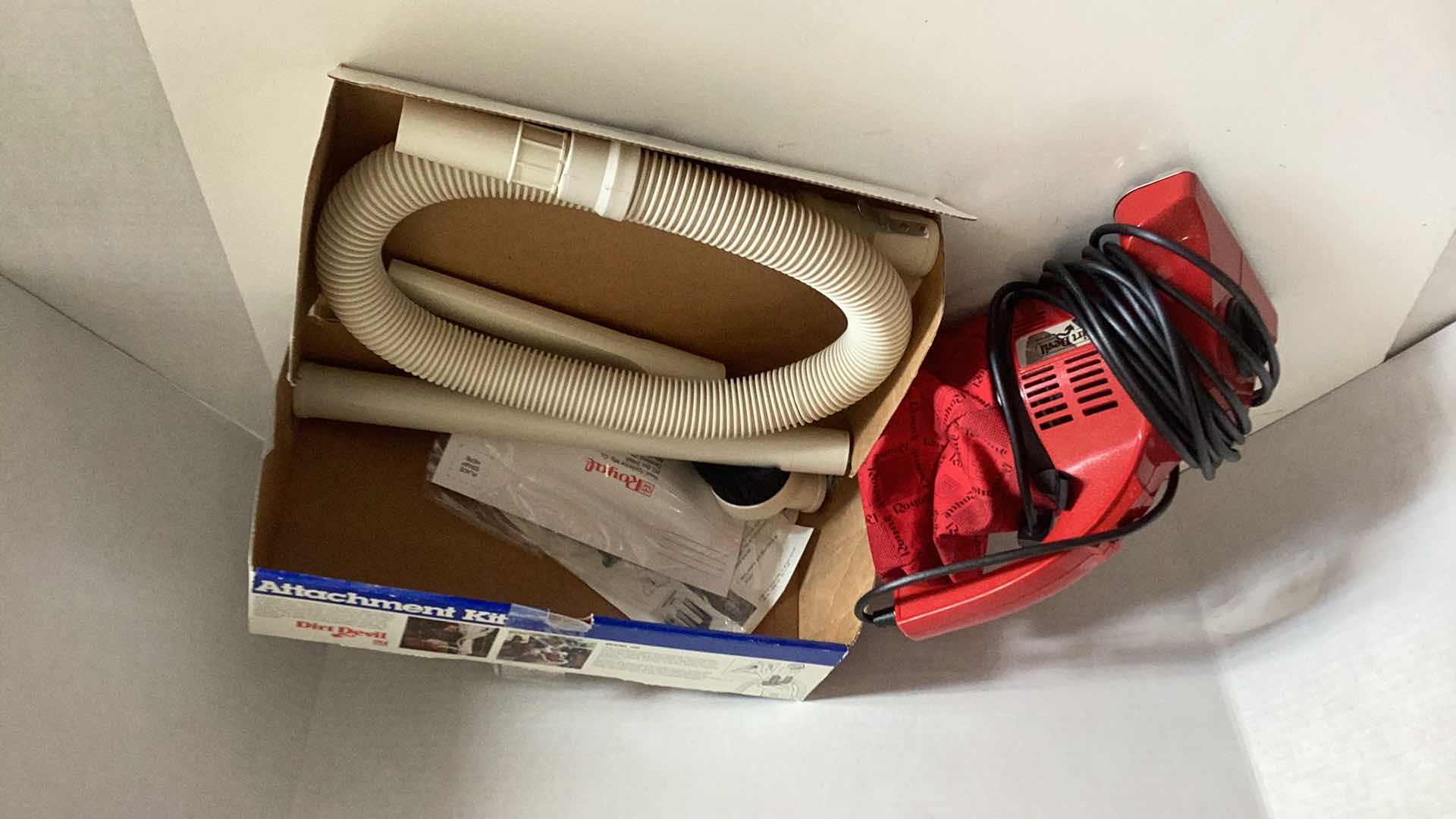 Photo 1 of DIRT DEVIL HAND VAC AND ATTACHMENT KIT