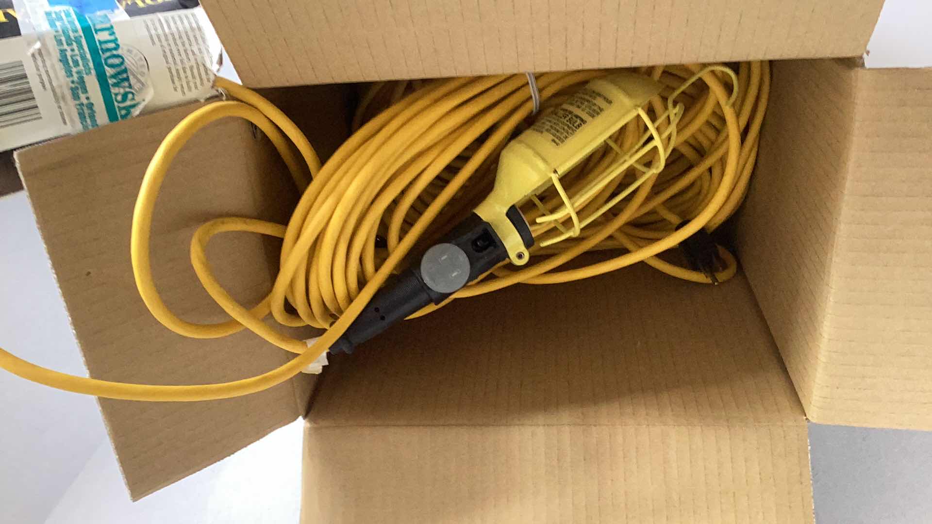 Photo 1 of 50 FOOT CORD MECHANICS GRADE SHOP LIGHT AND AN EXTRA EXTENSION CORD