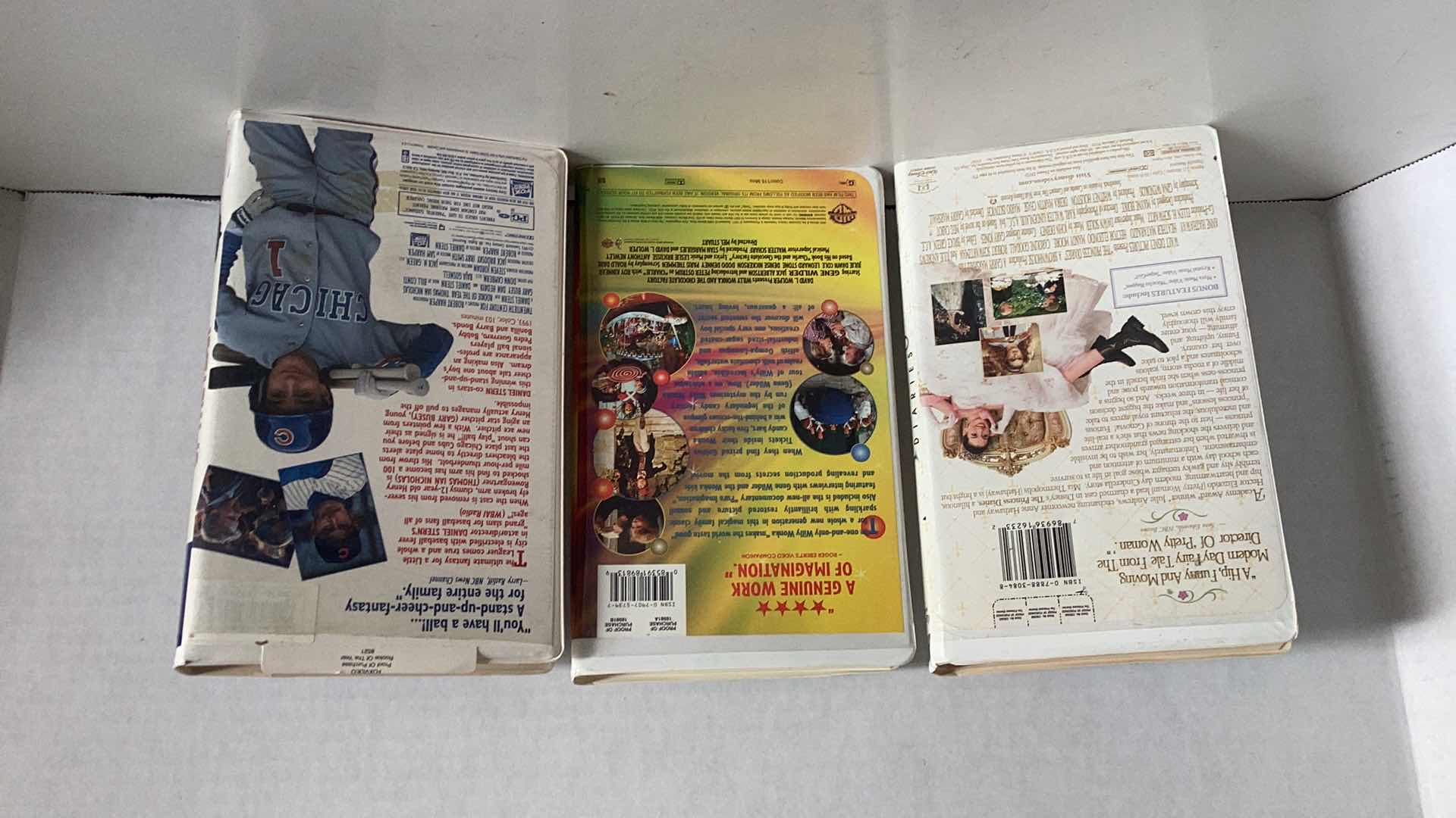 Photo 1 of THREE VINTAGE VHS TAPES