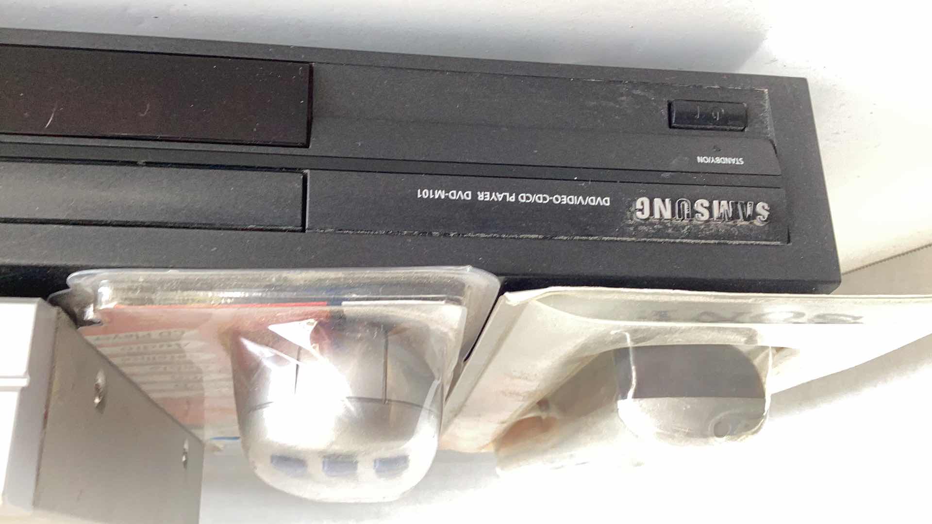 Photo 1 of TWO DVD PLAYERS AND TWO UNIVERSAL T.V. REMOTES