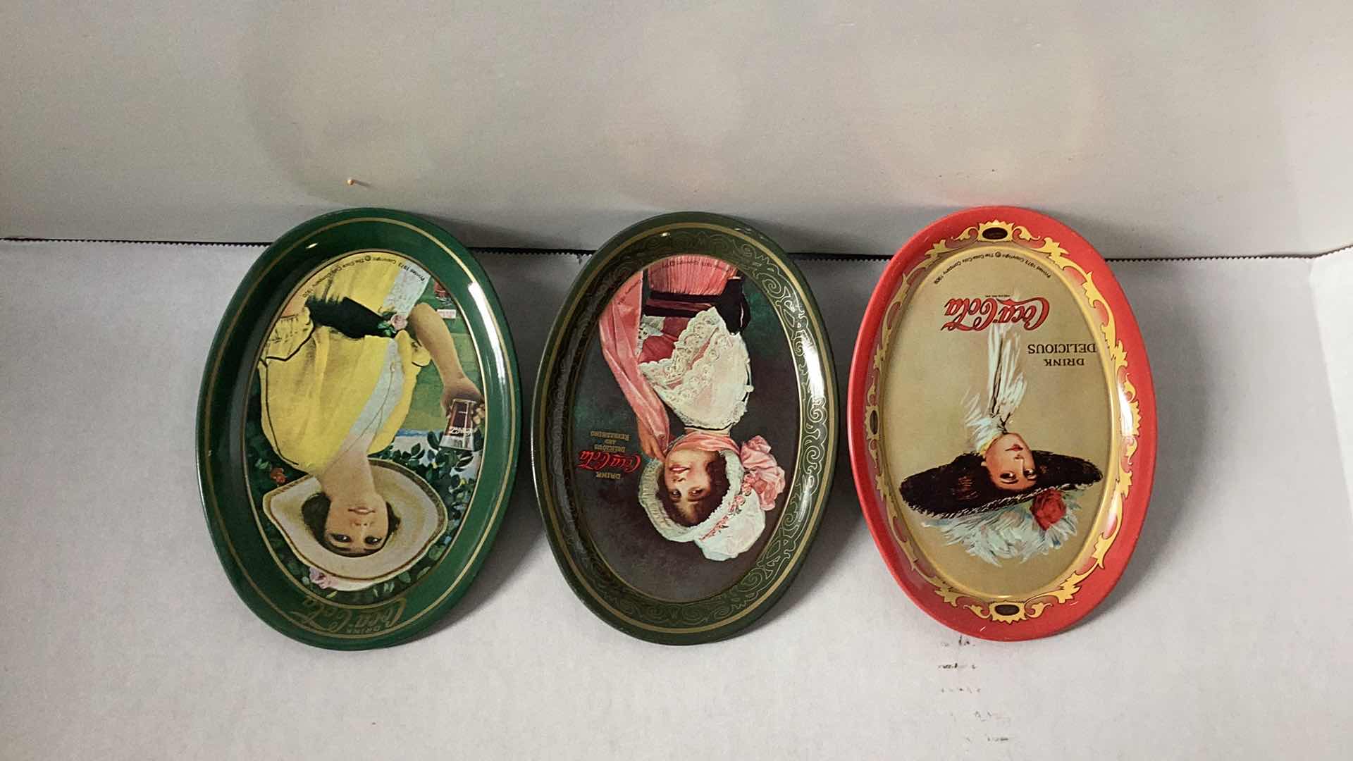 Photo 1 of THREE COCA COLA TINS 6” TALL