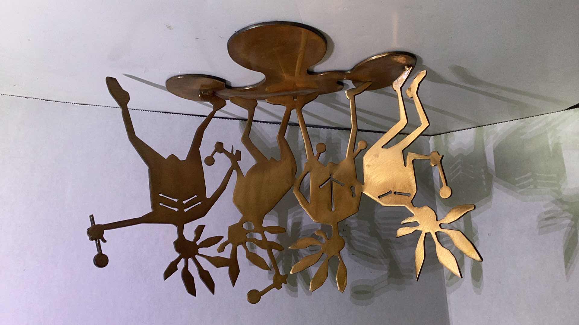 Photo 1 of METAL TRIBAL ARTWORK 15” X H 10”