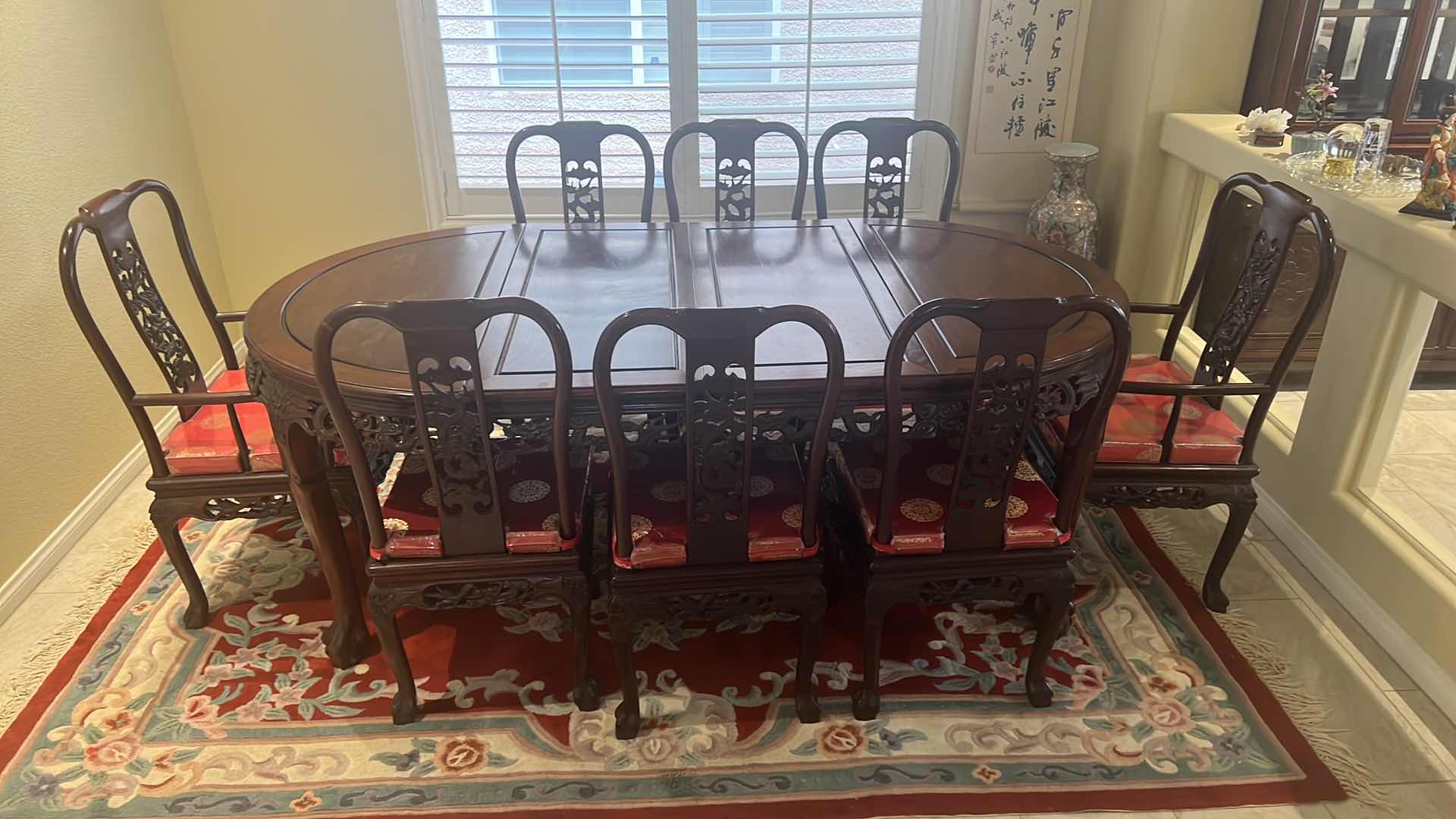 Photo 1 of VINTAGE CHINESE HANDCARVED ROSEWOOD DINING TABLE W 2-ARM CHAIRS & 6- SIDE CHAIRS (RED W GOLD PADDED SEAT CUSHIONS) TABLE 80” x 43” H30”