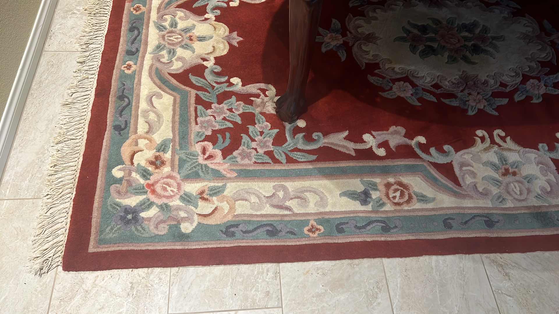 Photo 1 of BURGUNDY FLORAL AREA RUG W FRINGED EDGES 9'5" x 6'